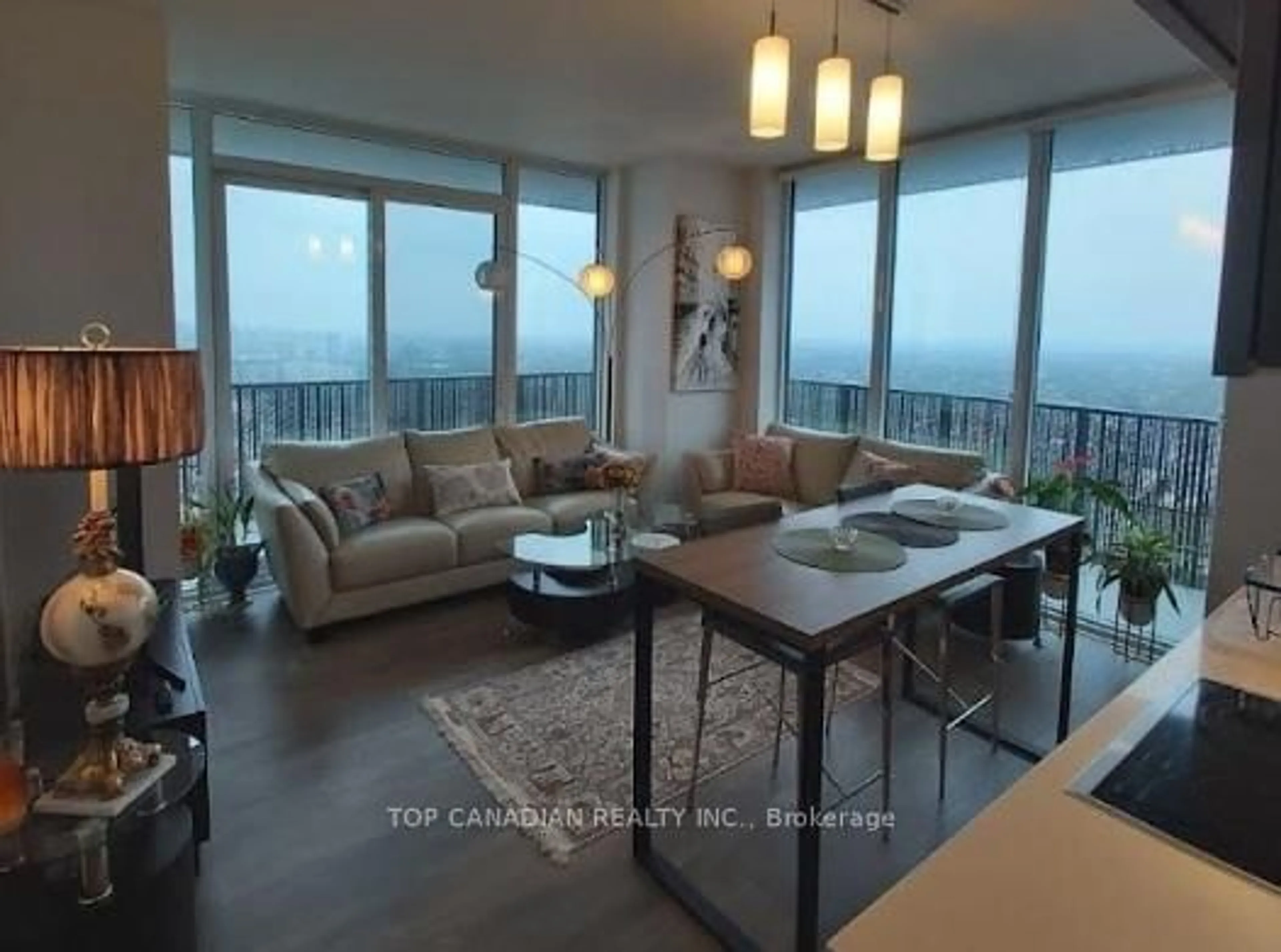 Living room with furniture, wood/laminate floor for 8 Eglinton Ave #3302, Toronto Ontario M4P 0C1