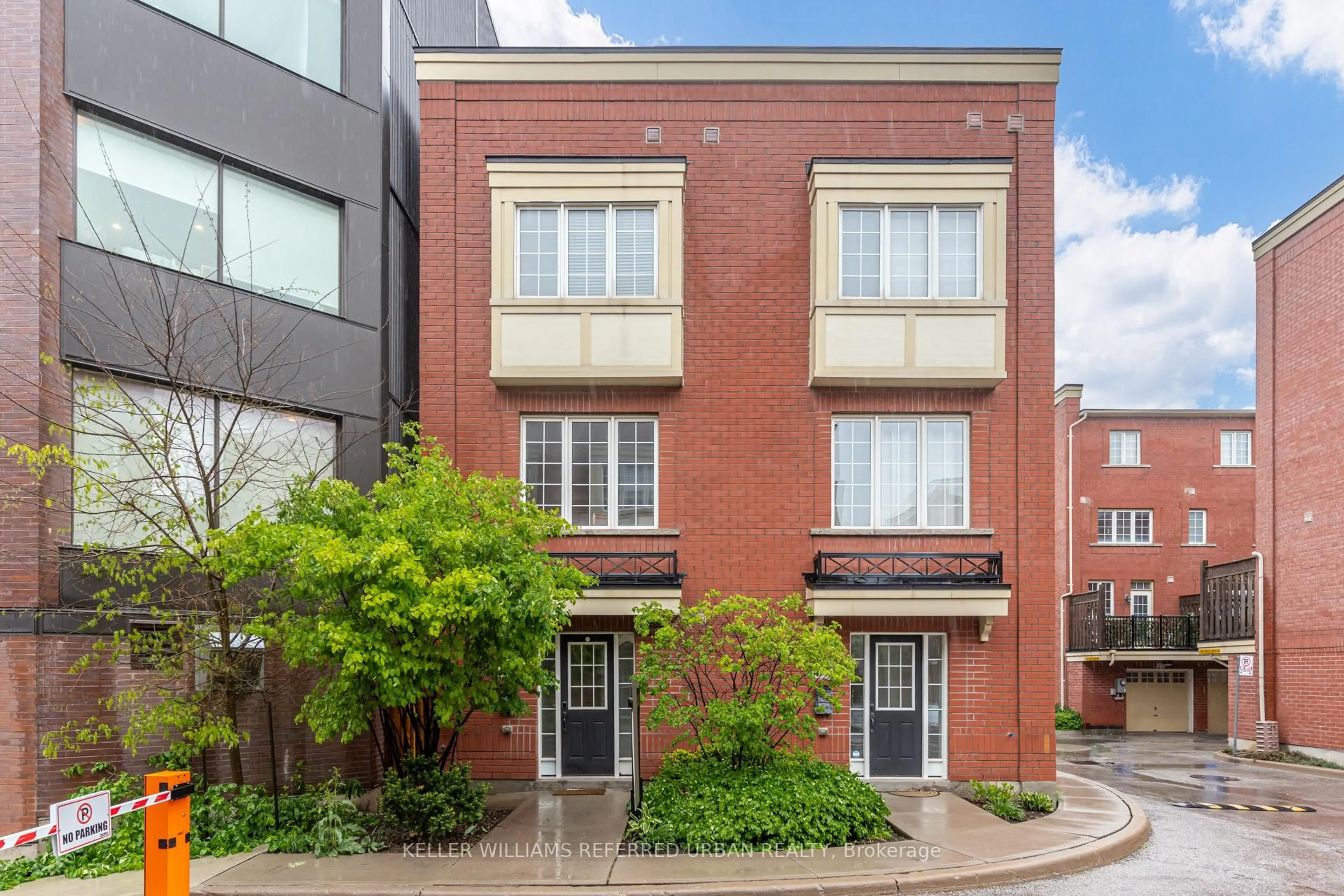 Home with brick exterior material, street for 68 Raffeix Lane, Toronto Ontario M5A 3P1