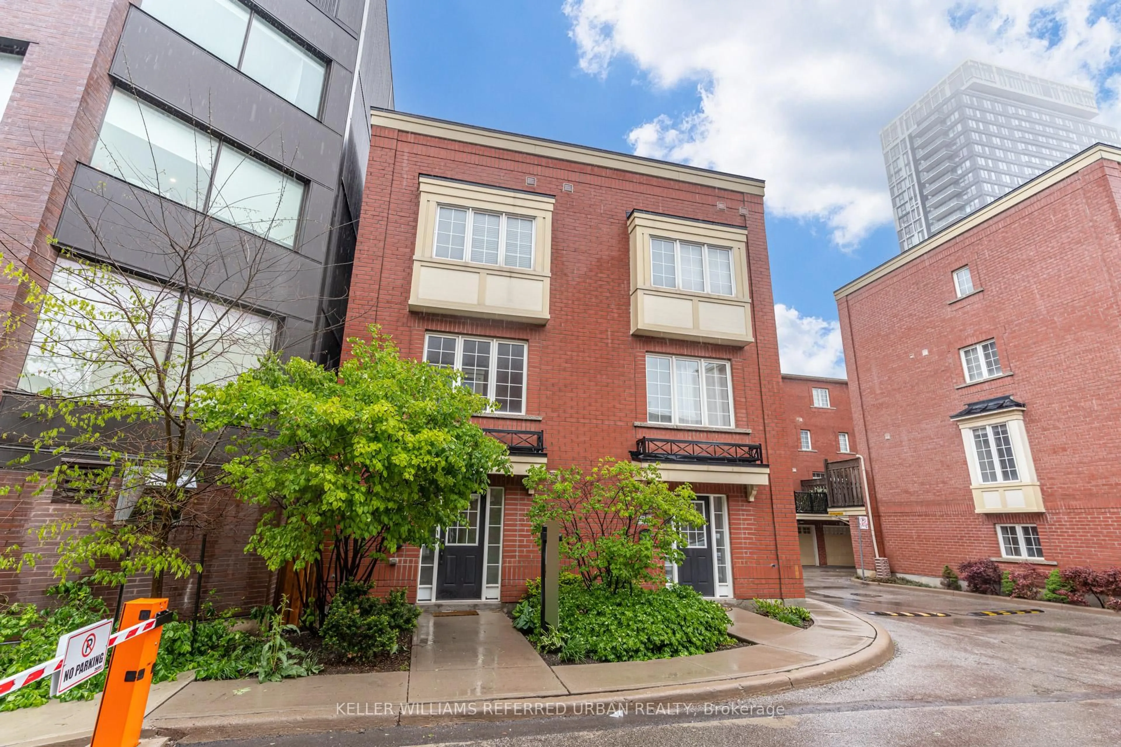 Home with brick exterior material, street for 68 Raffeix Lane, Toronto Ontario M5A 3P1