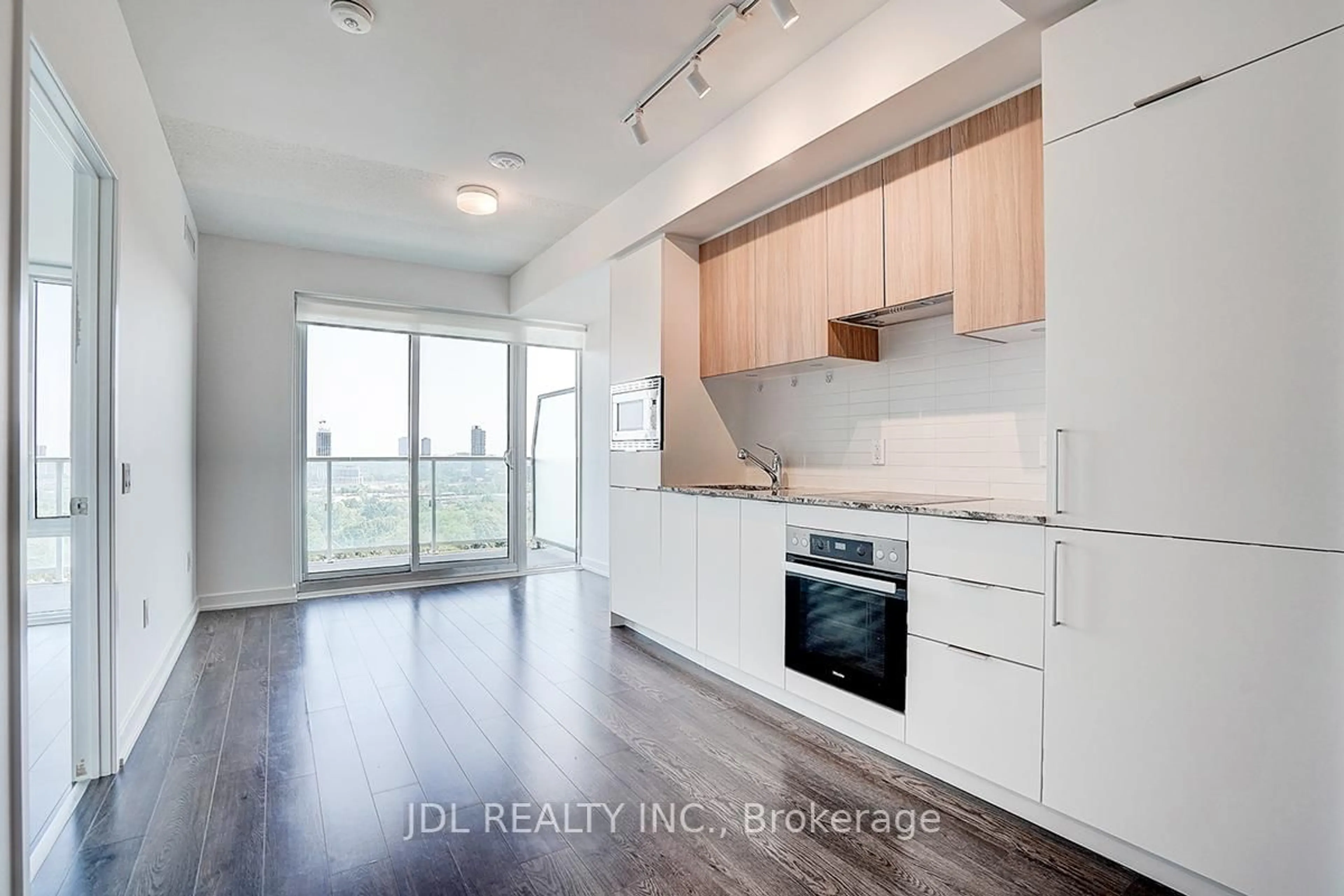 Open concept kitchen, wood/laminate floor for 20 O'Neill Rd #1213, Toronto Ontario M3C 0R2