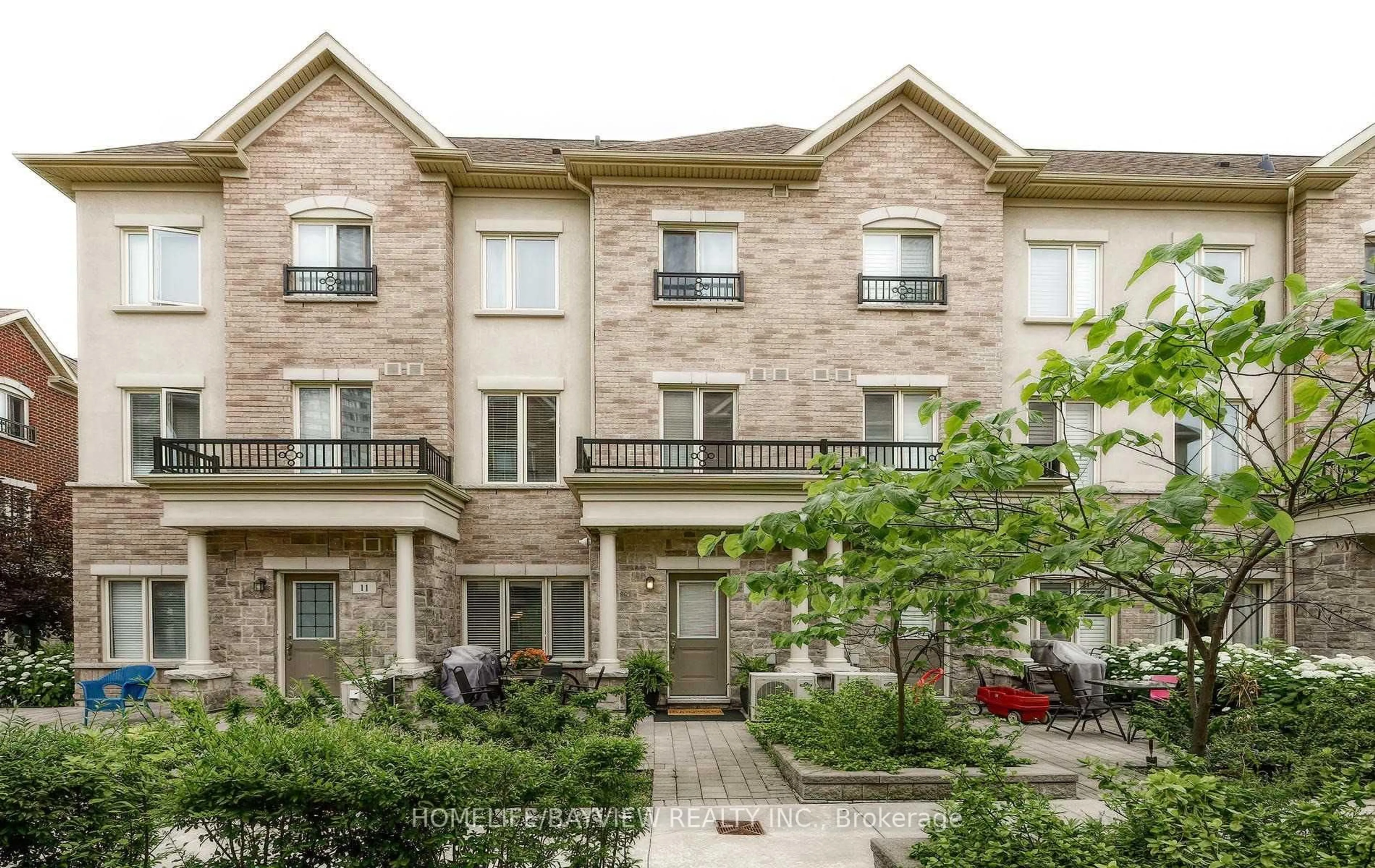Home with brick exterior material, street for 25 Coneflower Cres #Th 12, Toronto Ontario M2R 0A4