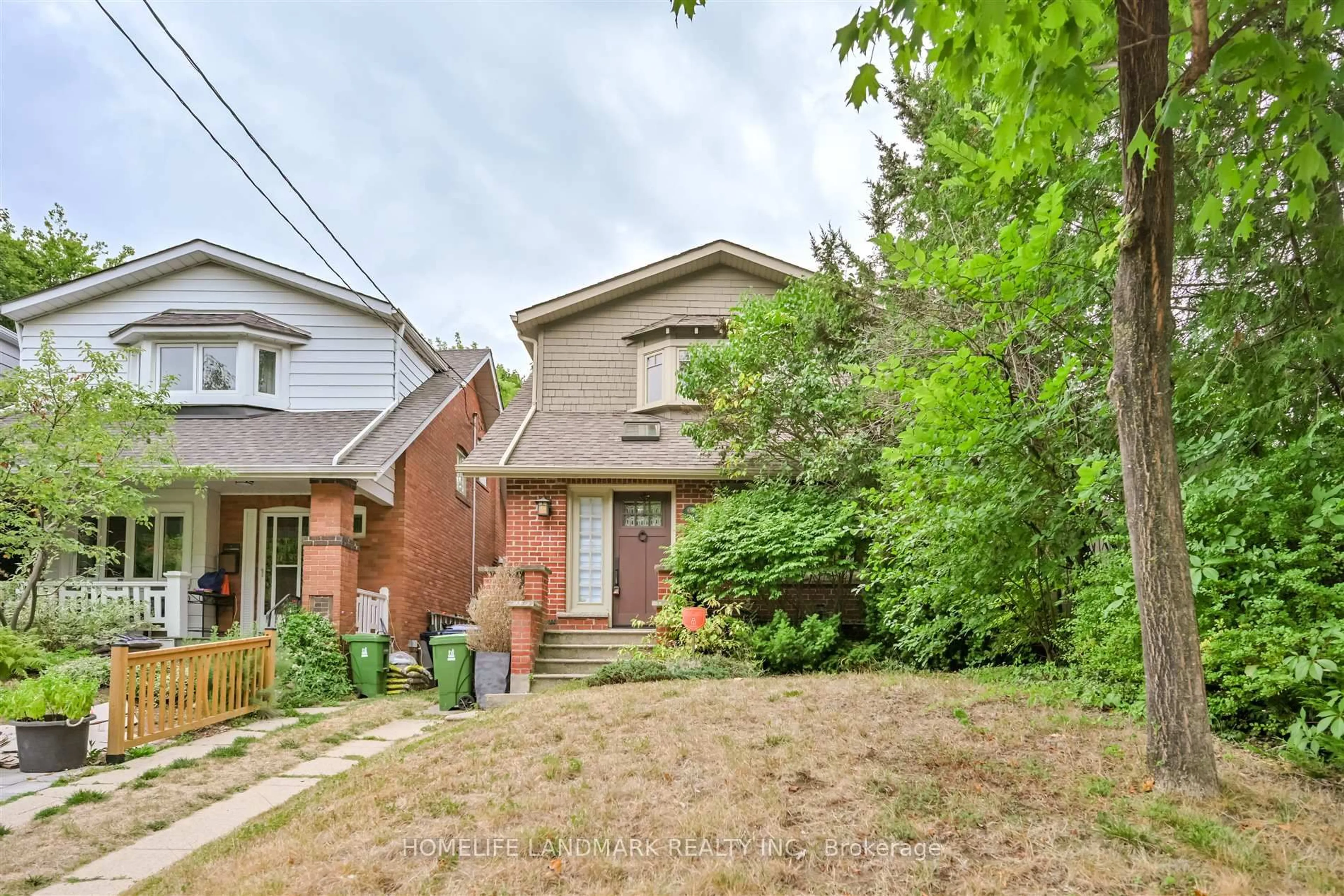 Home with brick exterior material, street for 26 Birdsall Ave, Toronto Ontario M4R 2B8