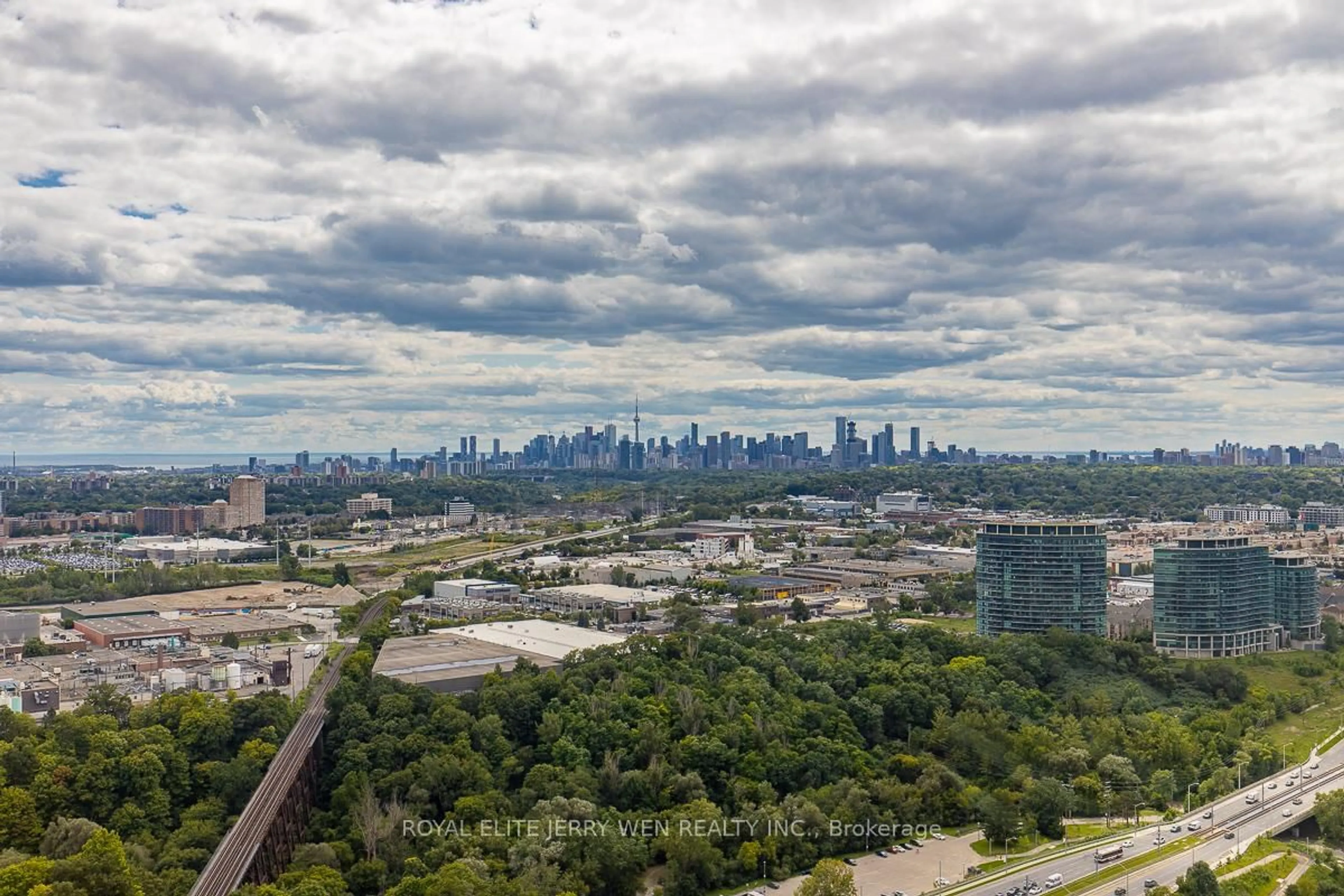 A pic from outside/outdoor area/front of a property/back of a property/a pic from drone, city buildings view from balcony for 30 Inn On The Park Dr #3410, Toronto Ontario M3C 0P7