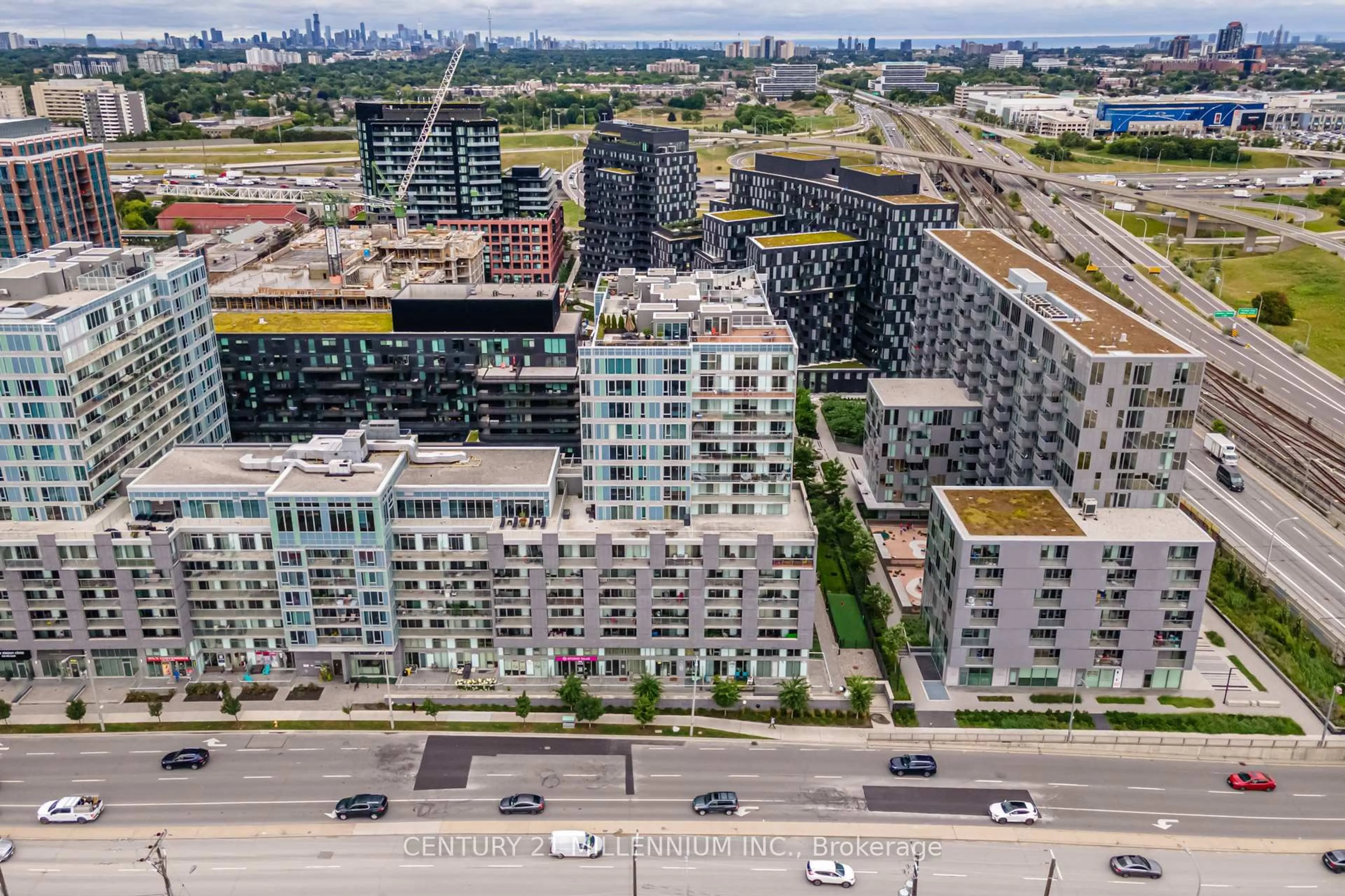A pic from outside/outdoor area/front of a property/back of a property/a pic from drone, city buildings view from balcony for 565 Wilson Ave #513, Toronto Ontario M3H 0C6