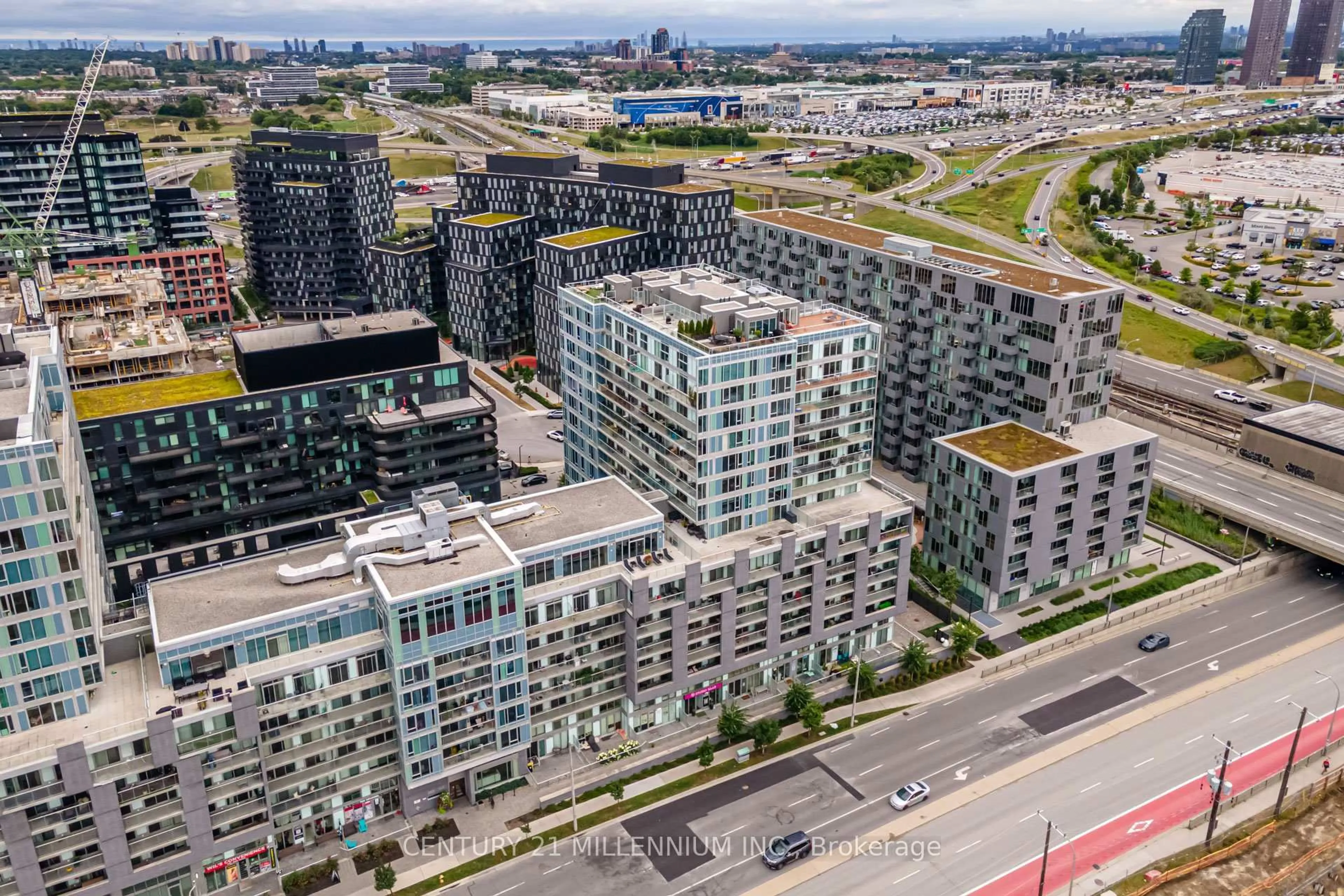 A pic from outside/outdoor area/front of a property/back of a property/a pic from drone, city buildings view from balcony for 565 Wilson Ave #513, Toronto Ontario M3H 0C6