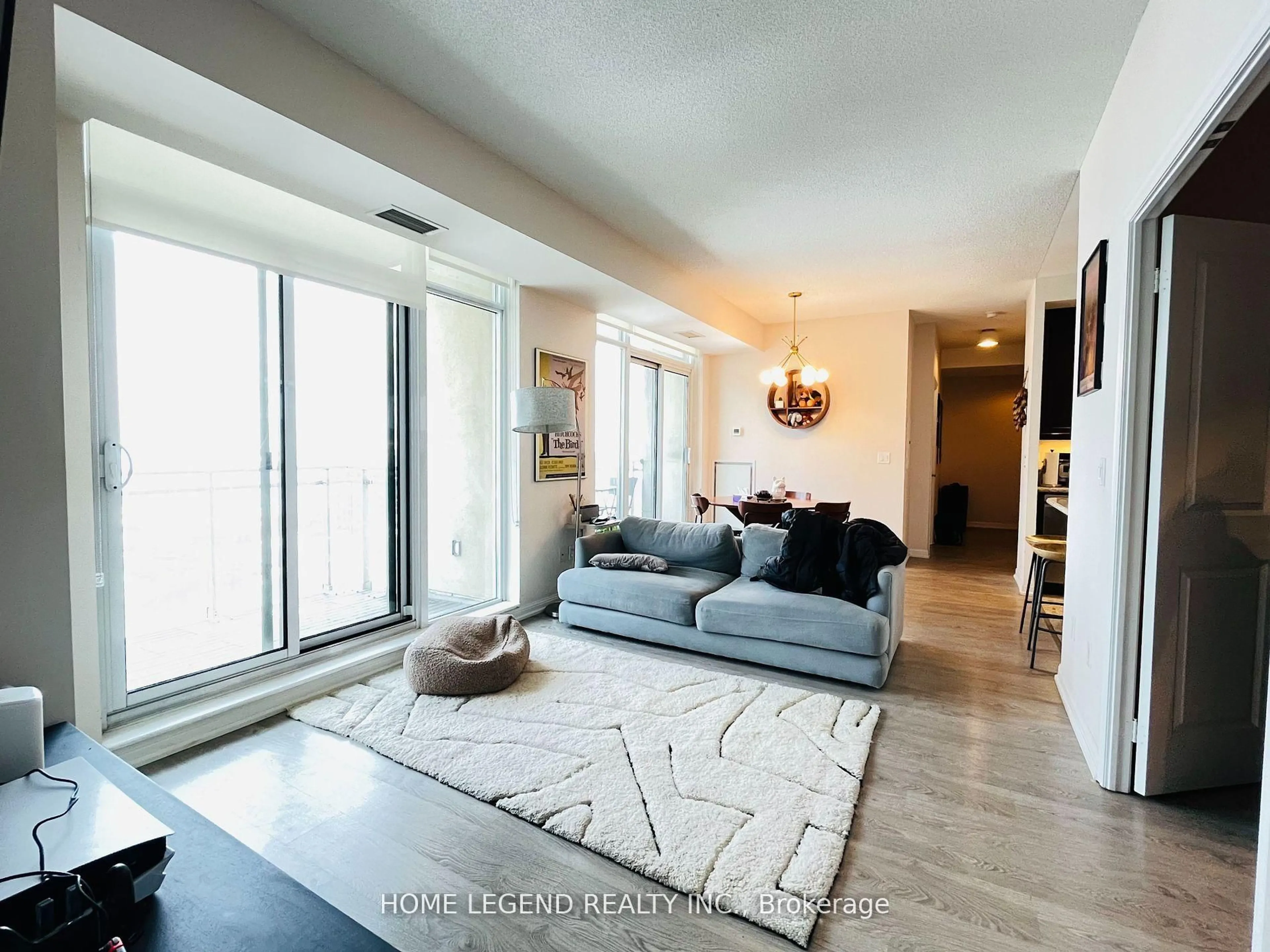 Living room with furniture, unknown for 21 Grand Magazine St #1809, Toronto Ontario M5V 1B5