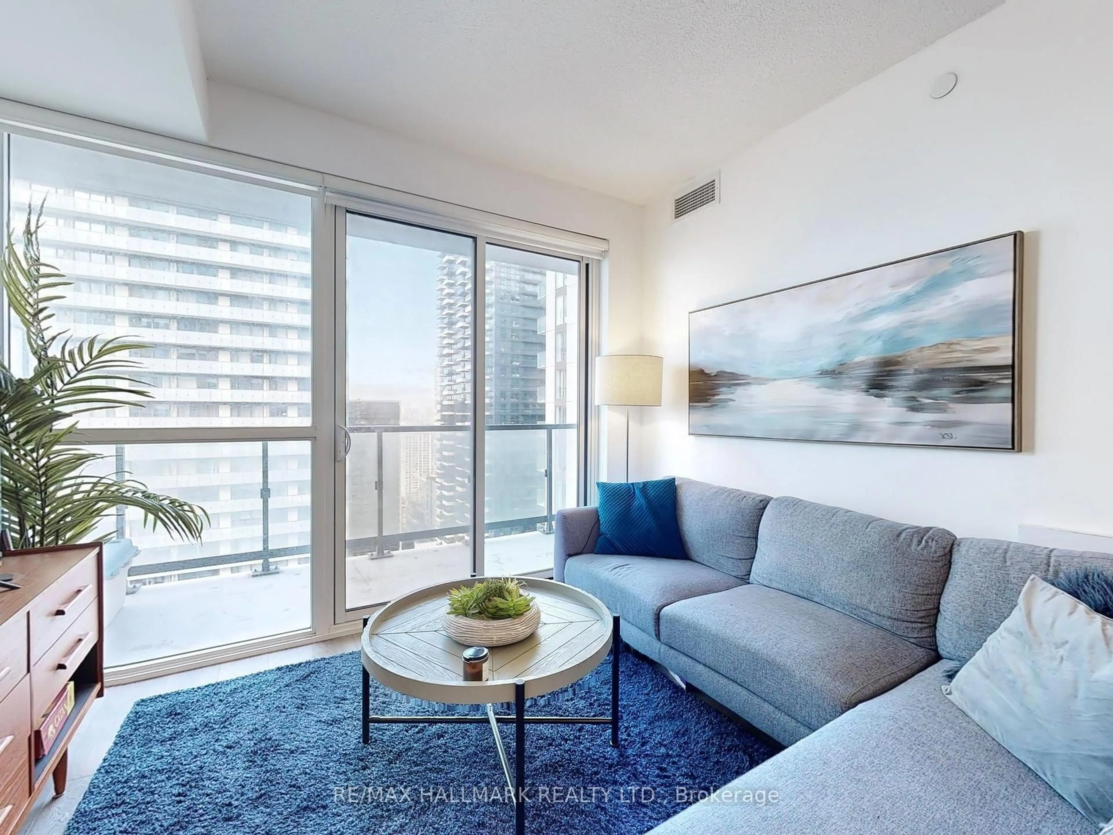 Living room with furniture, carpet floor for 87 Peter St #3010, Toronto Ontario M5V 0P1