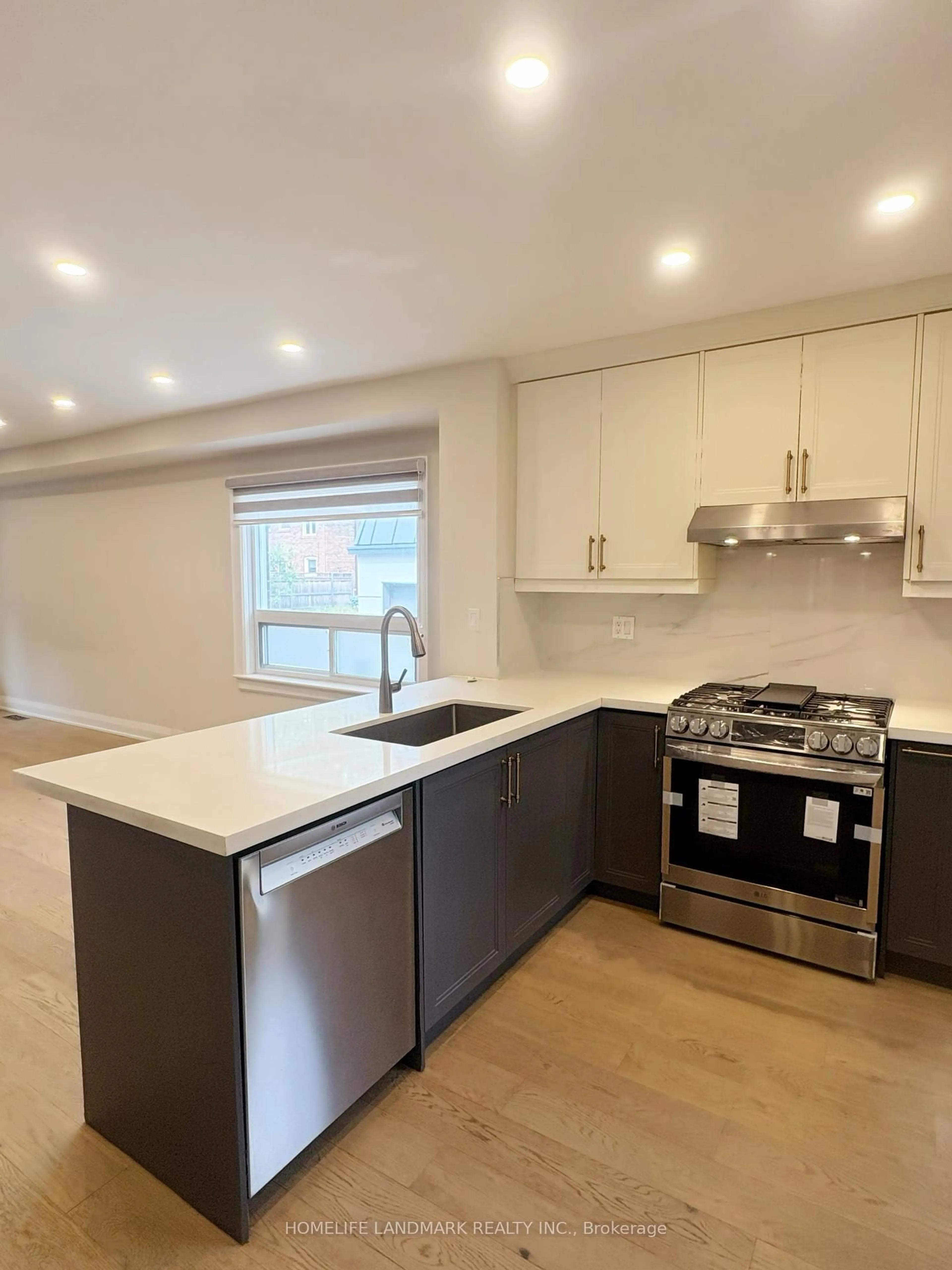 Open concept kitchen, unknown for 111 Greer Rd, Toronto Ontario M5M 3N2