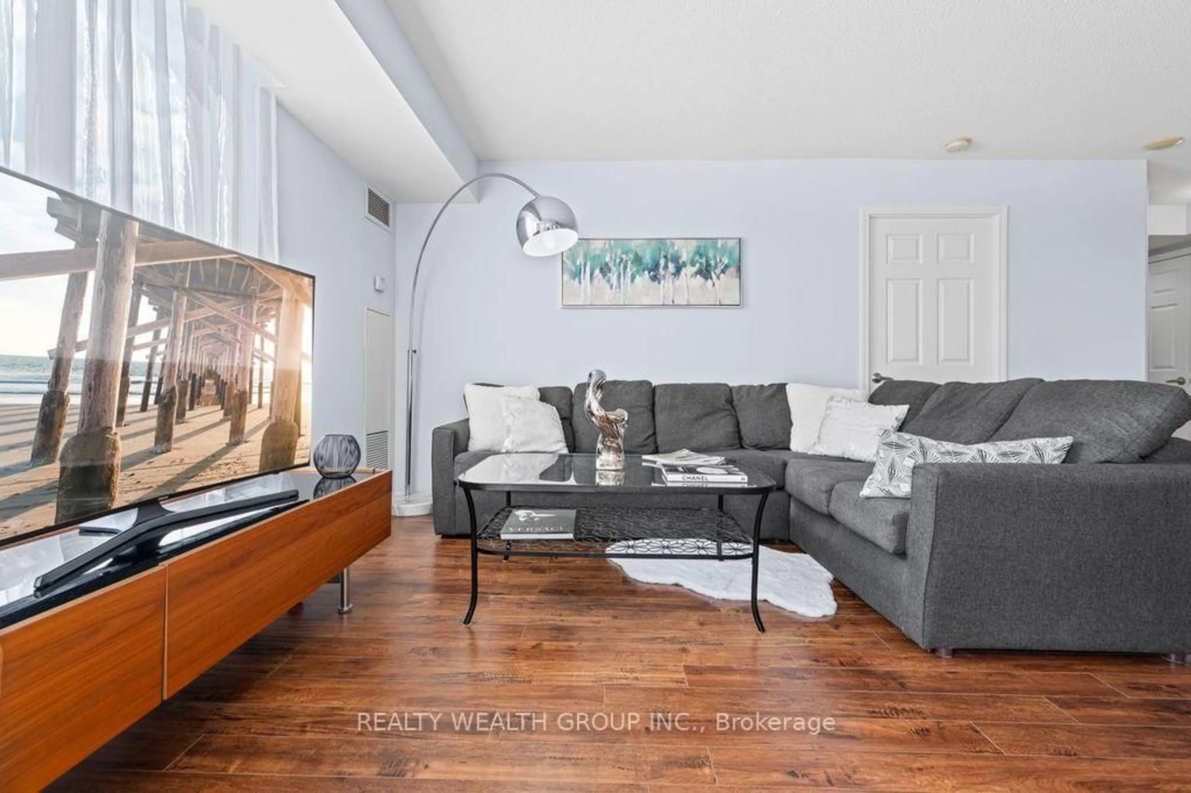 Living room with furniture, wood/laminate floor for 5940 Yonge St #513, Toronto Ontario M2M 4M6
