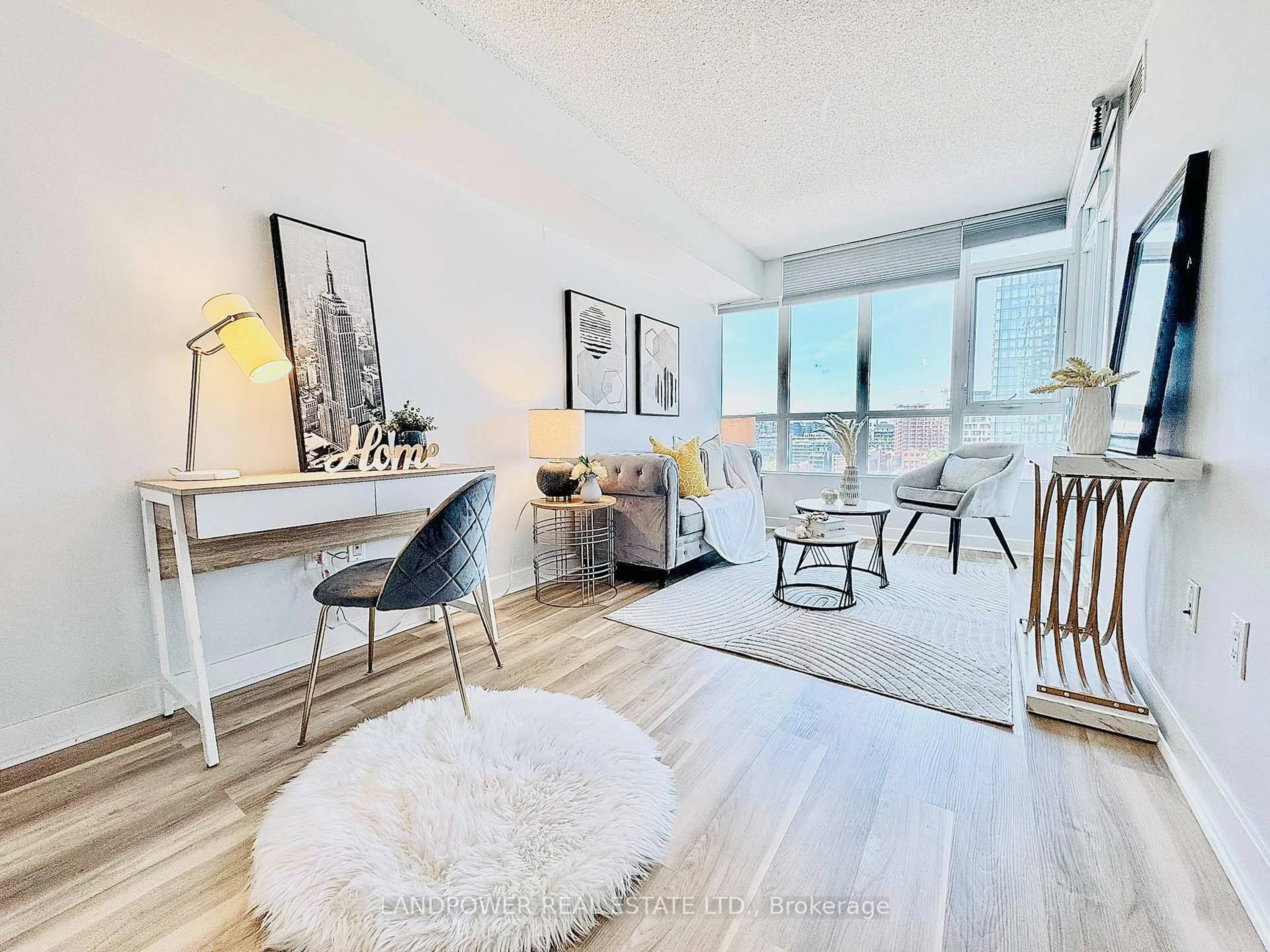 Living room with furniture, wood/laminate floor for 10 Capreol Crt #1503, Toronto Ontario M5V 4B3