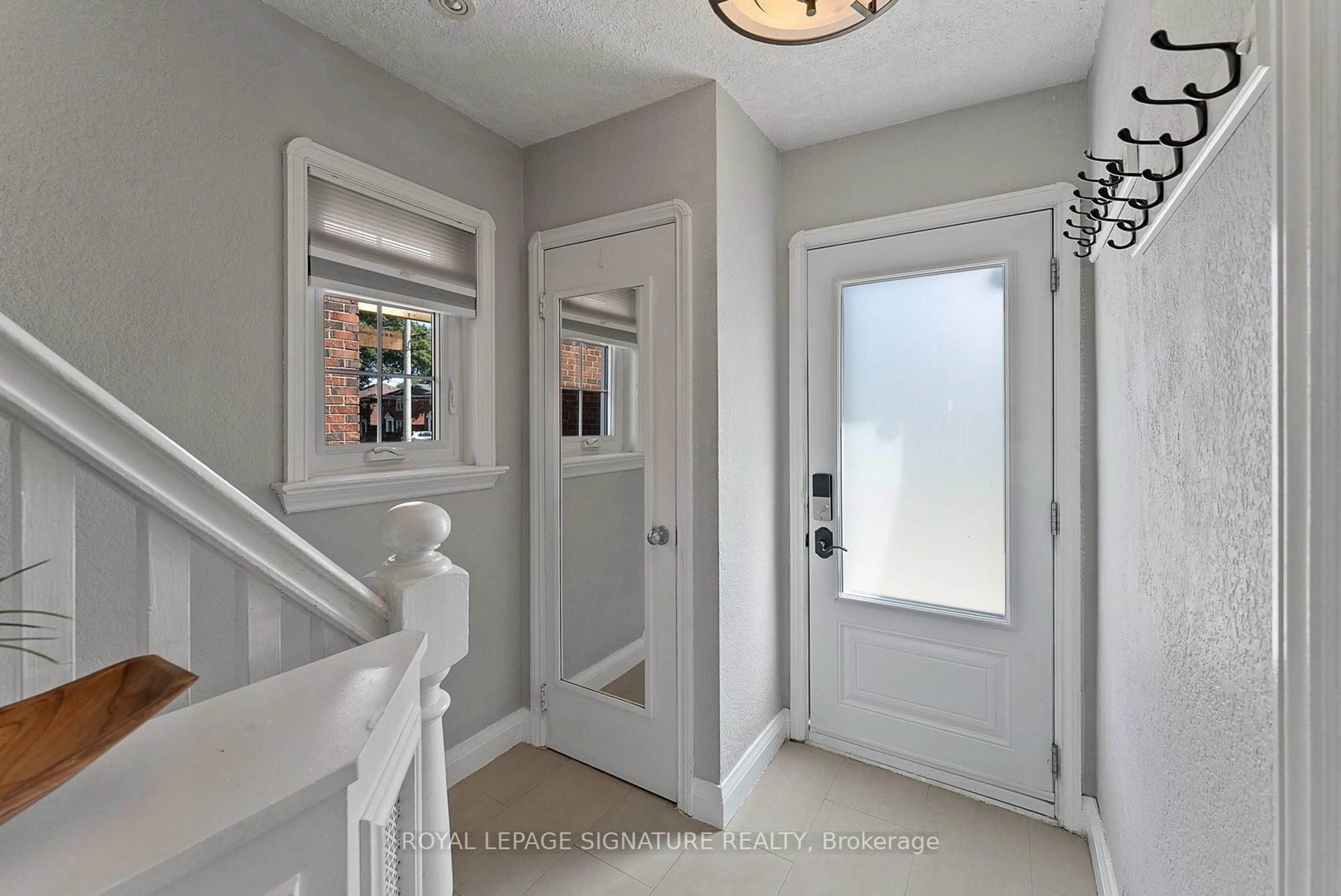 Indoor entryway for 18 Vanderhoof Ave, Toronto Ontario M4G 2H1