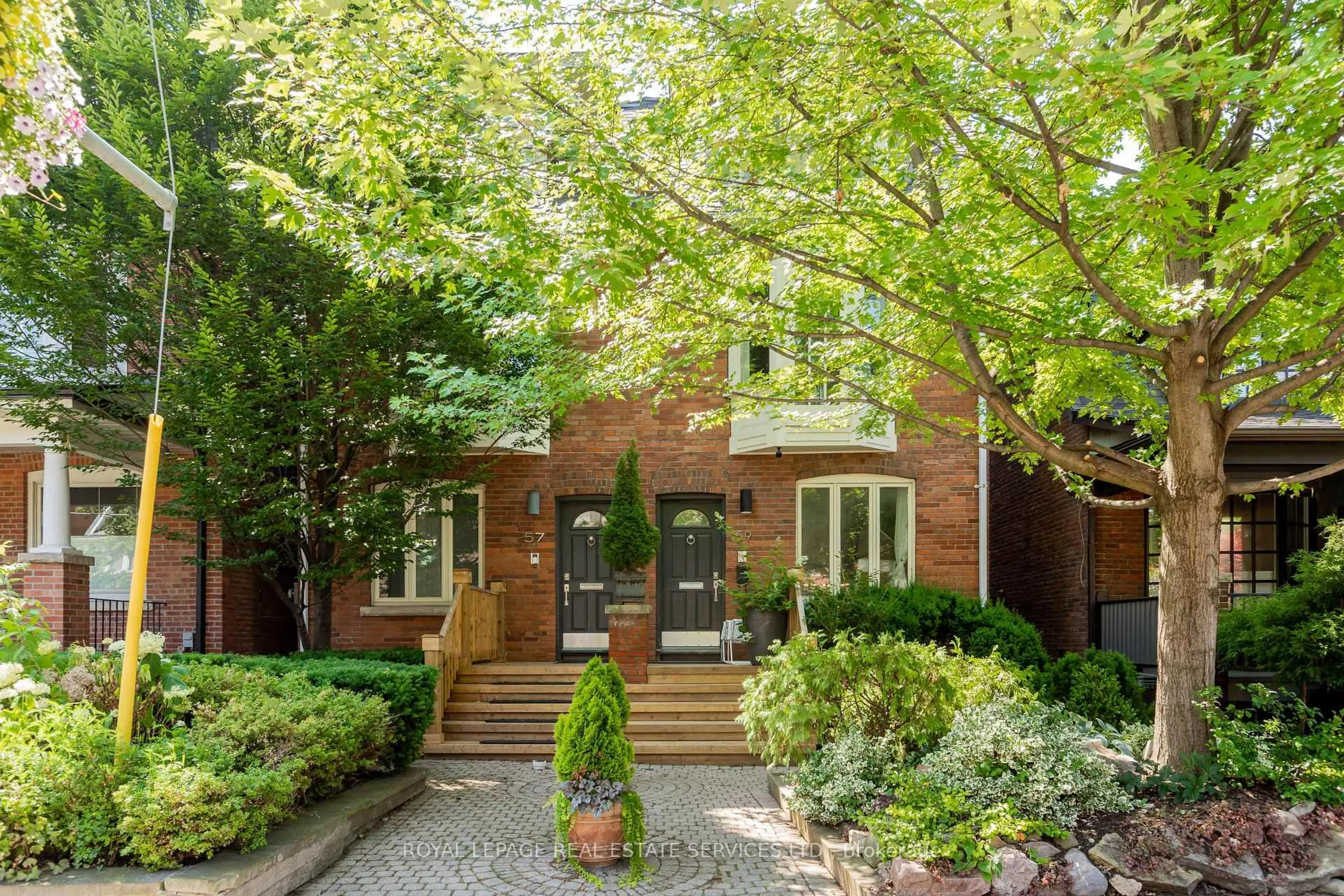 Home with brick exterior material, street for 59 Dupont St, Toronto Ontario M5R 1V3
