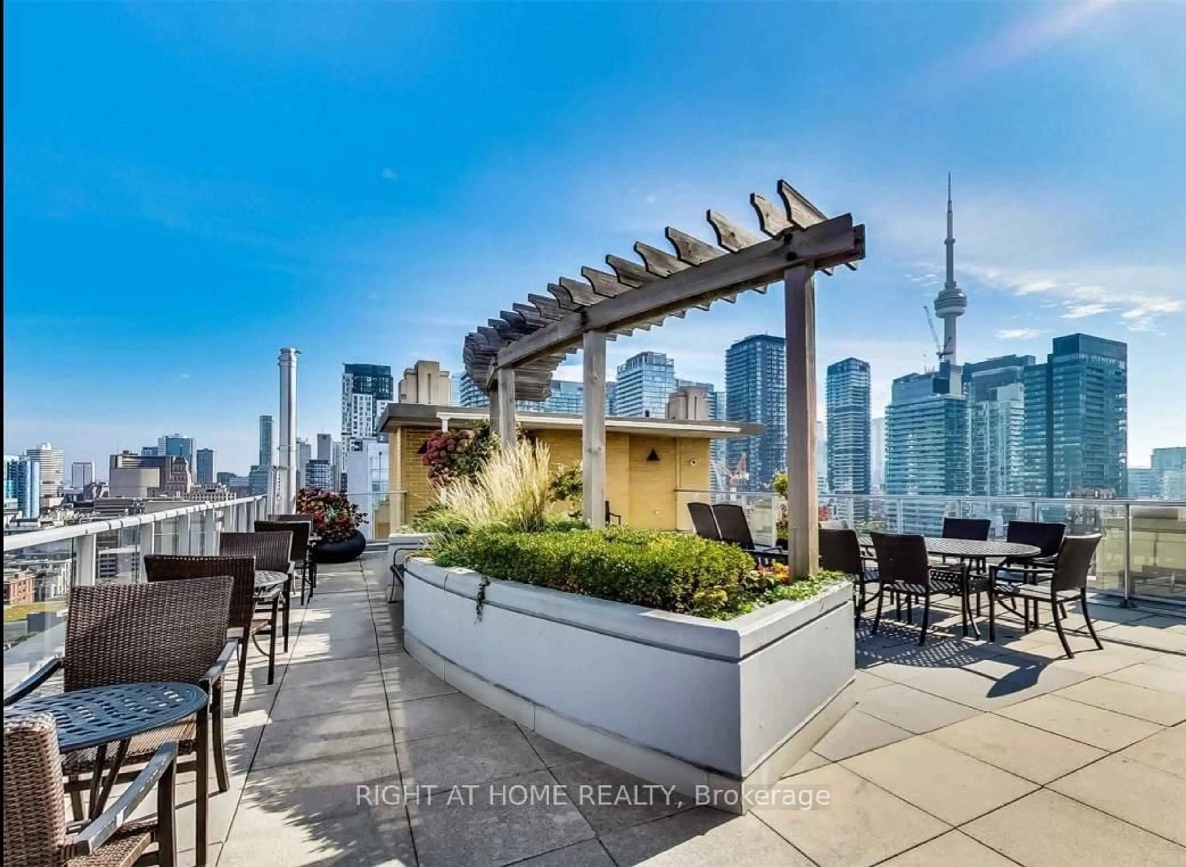 Patio, city buildings view from balcony for 438 Richmond St #908, Toronto Ontario M5V 3S6