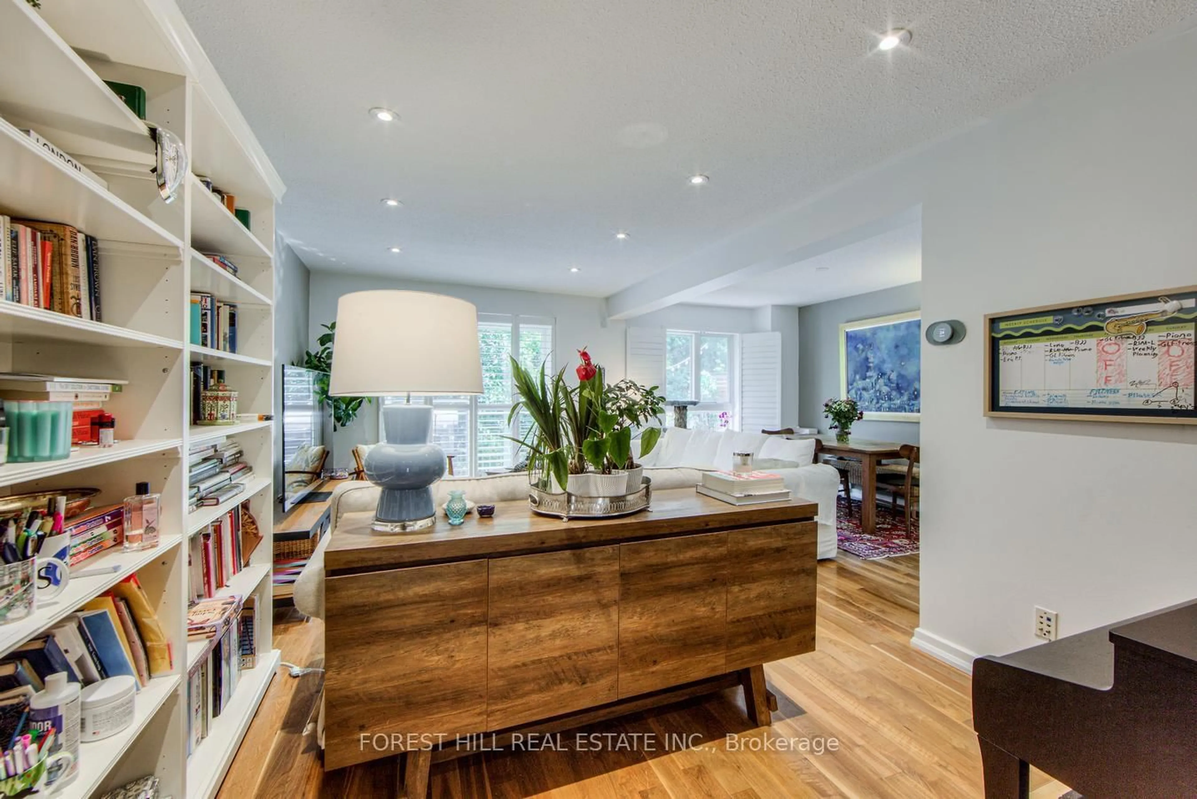 Living room with furniture, wood/laminate floor for 7 Maroon Mill Way, Toronto Ontario M2L 1T9