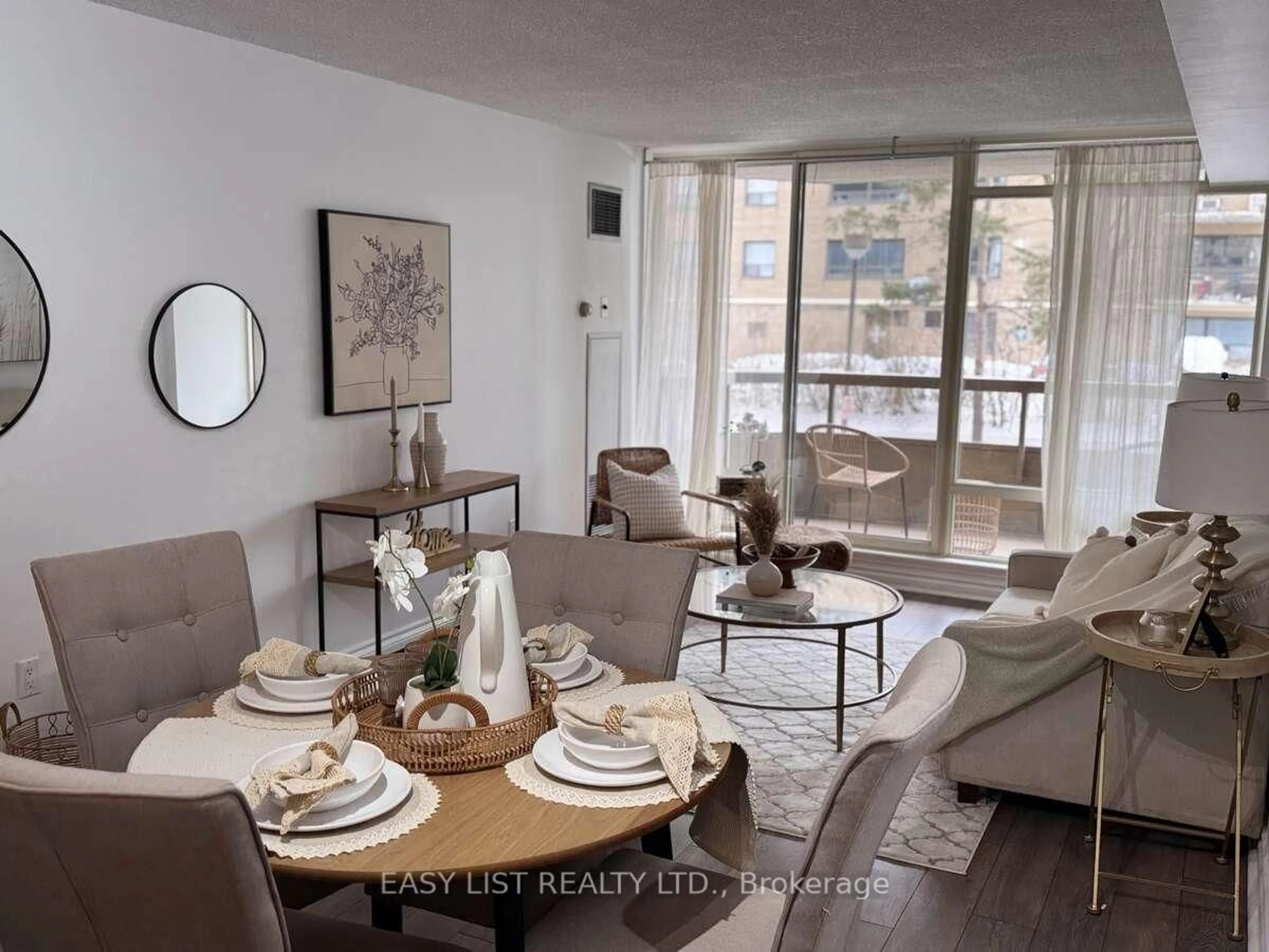 Living room with furniture, unknown for 1200 Don Mills Rd #213, Toronto Ontario M3B 3N8