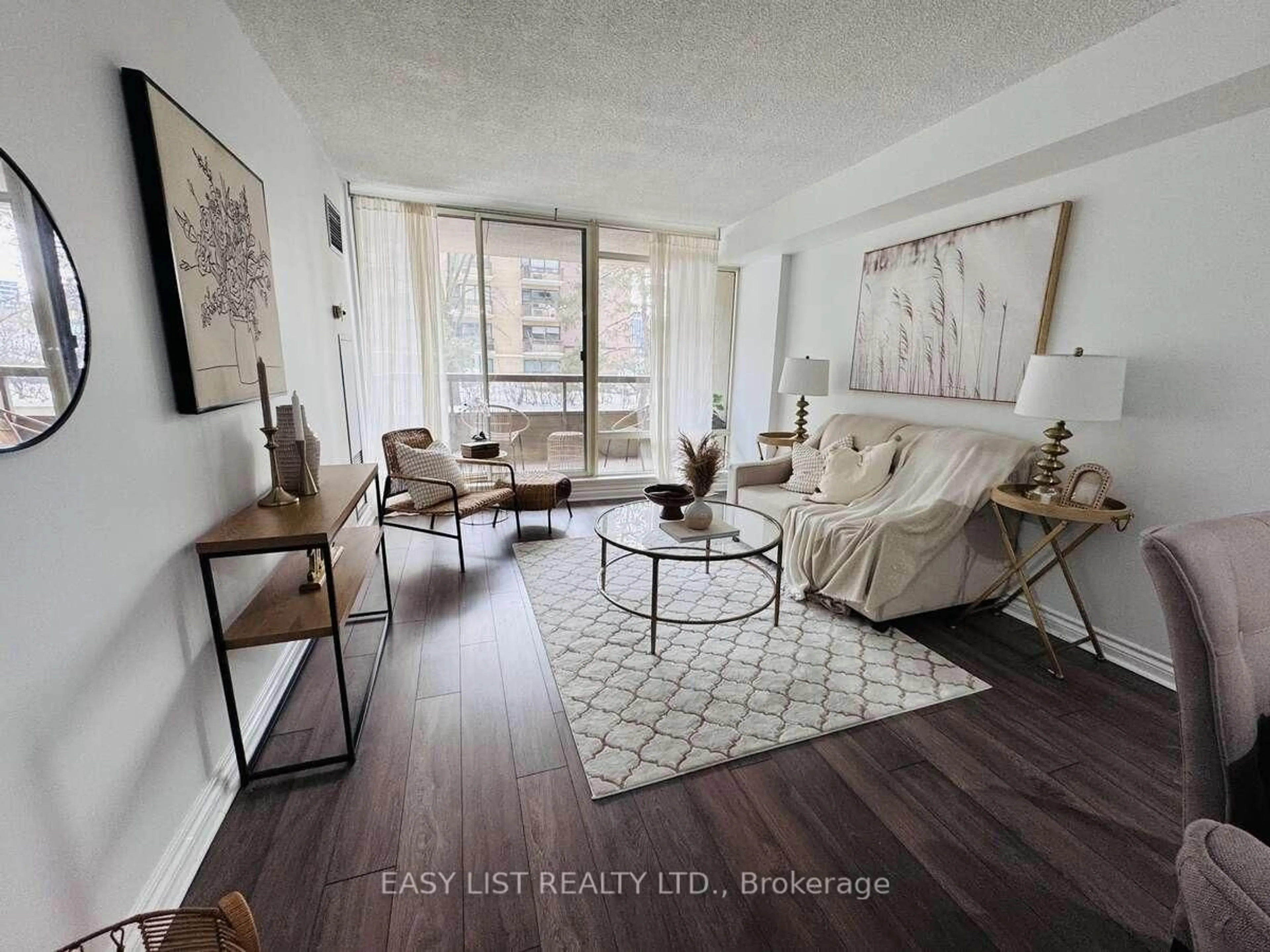 Living room with furniture, unknown for 1200 Don Mills Rd #213, Toronto Ontario M3B 3N8