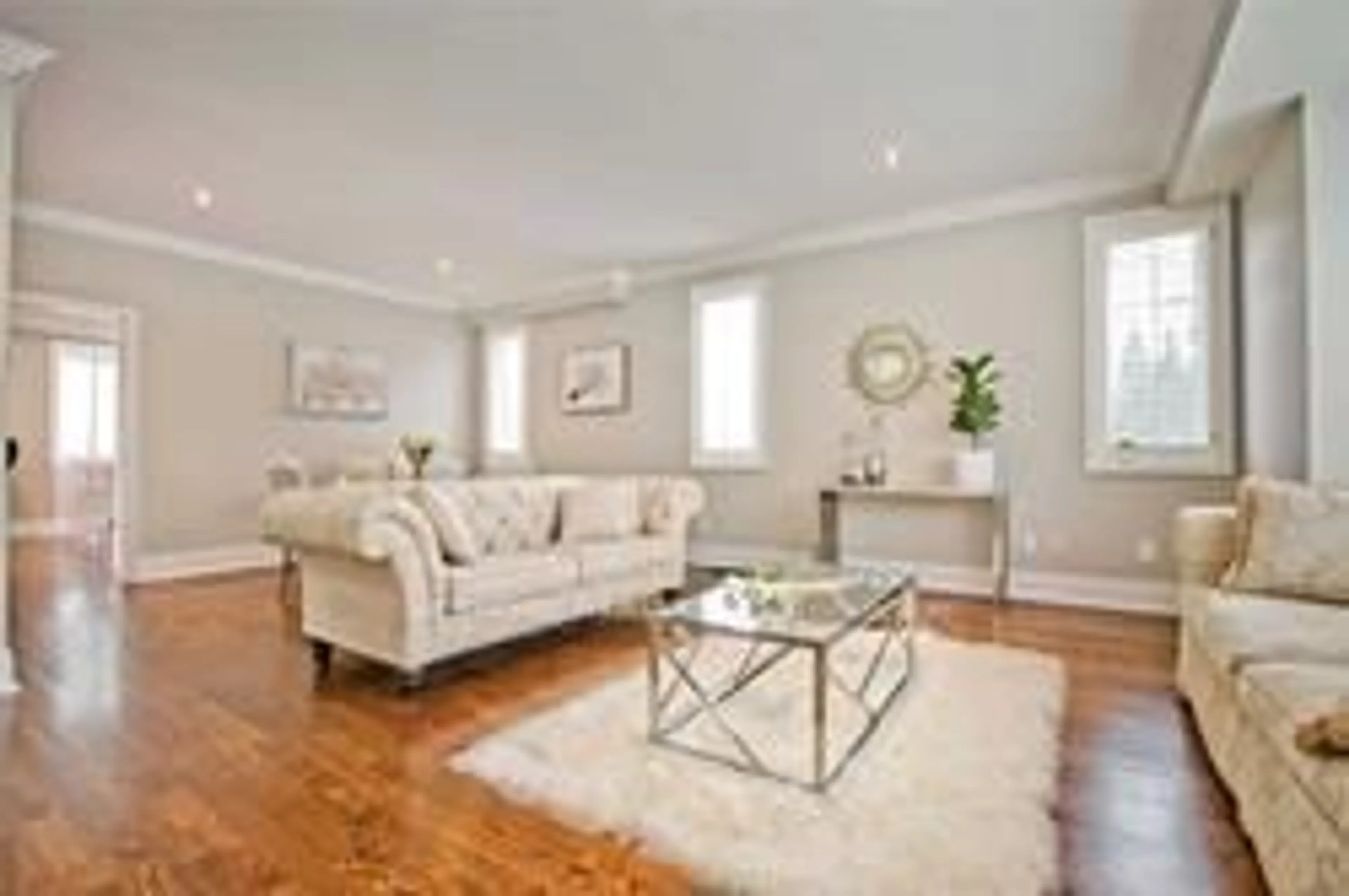 Living room with furniture, wood/laminate floor for 401 Longmore St, Toronto Ontario M2N 5C2
