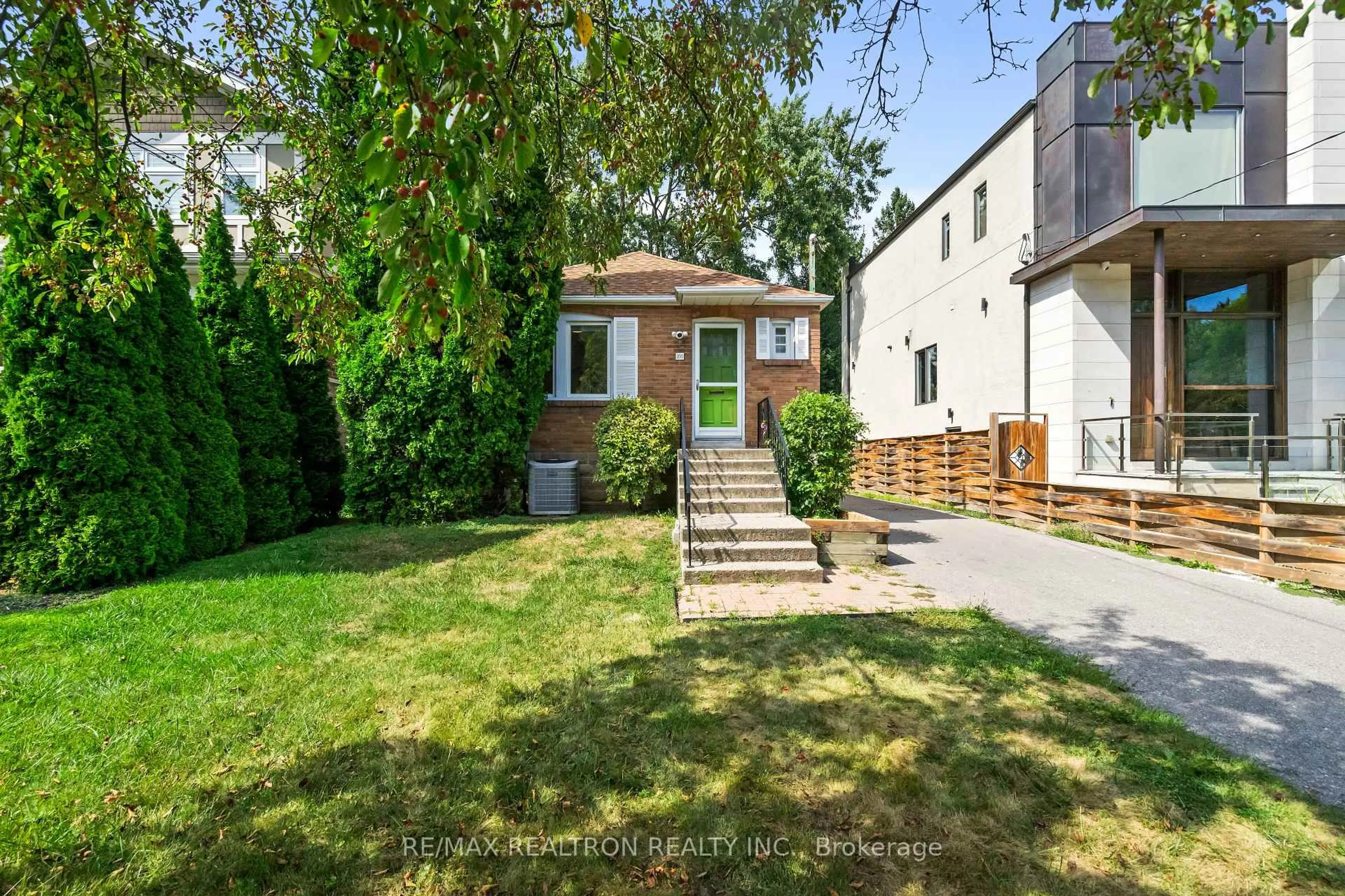 Home with brick exterior material, street for 100 Park Home Ave, Toronto Ontario M2N 1W8
