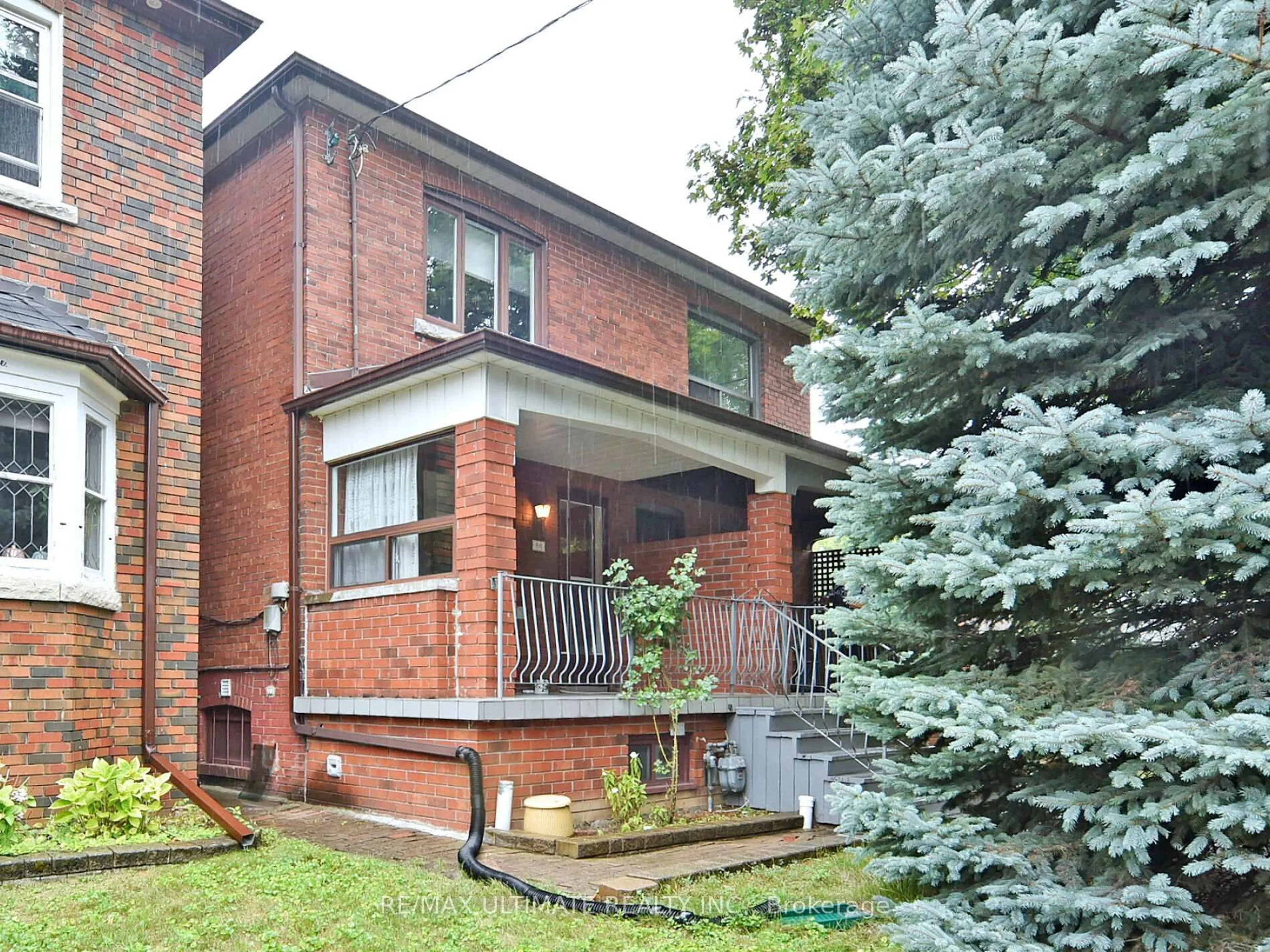 Home with brick exterior material, street for 86 CHERRYWOOD Ave, Toronto Ontario M6C 2X3