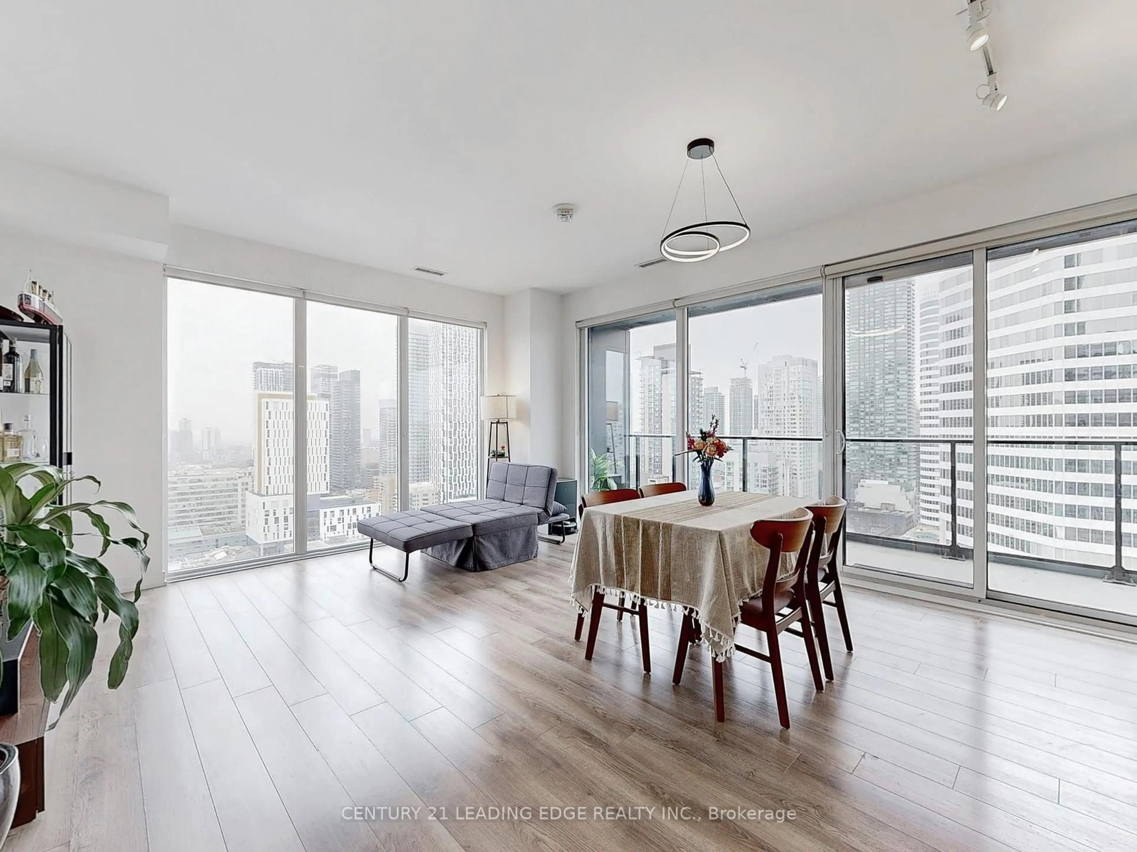 Living room with furniture, wood/laminate floor for 20 Edward St #2403, Toronto Ontario M5G 0C5