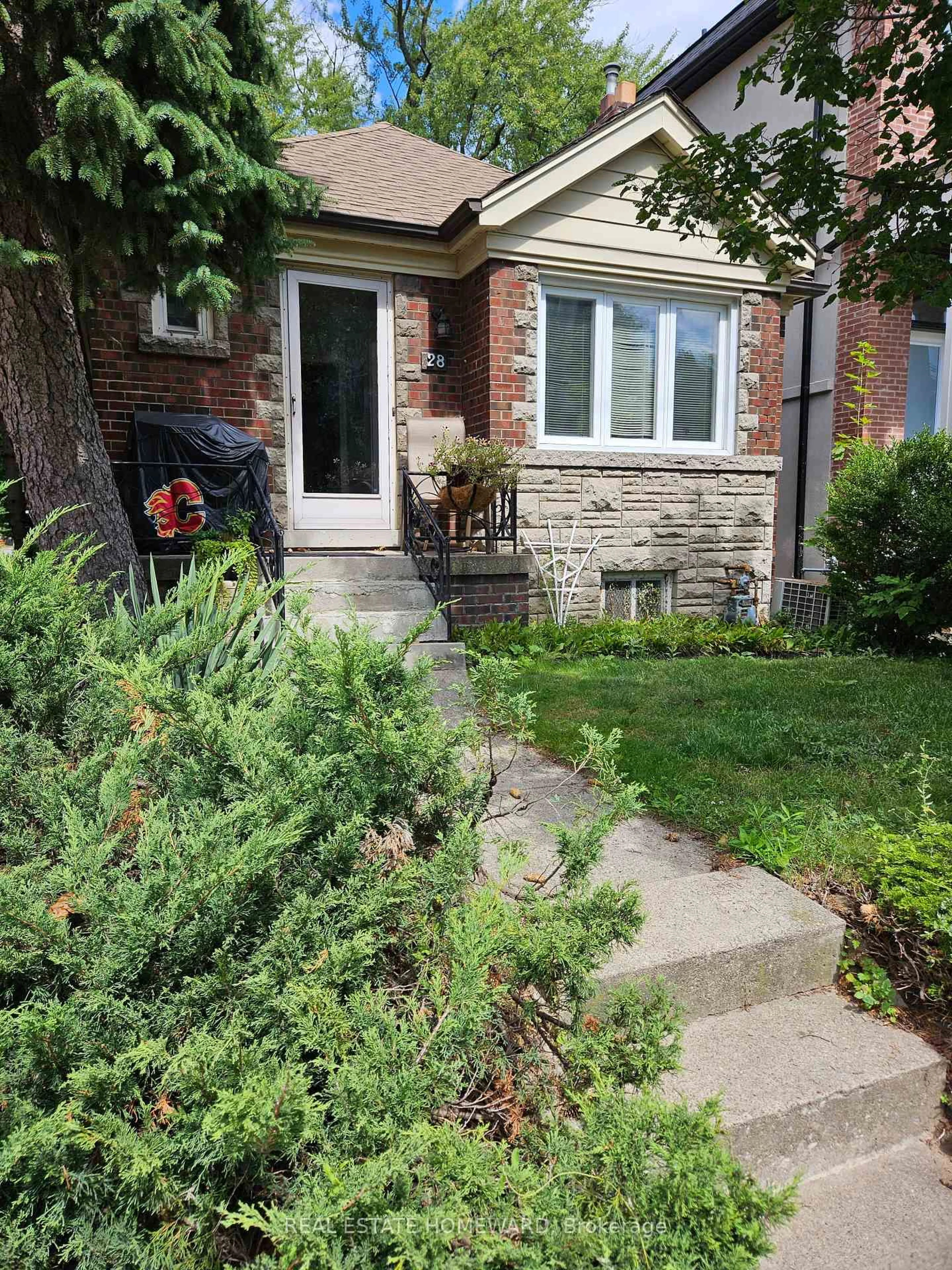Home with brick exterior material, street for 28 Glen Echo Rd, Toronto Ontario M4N 2E1