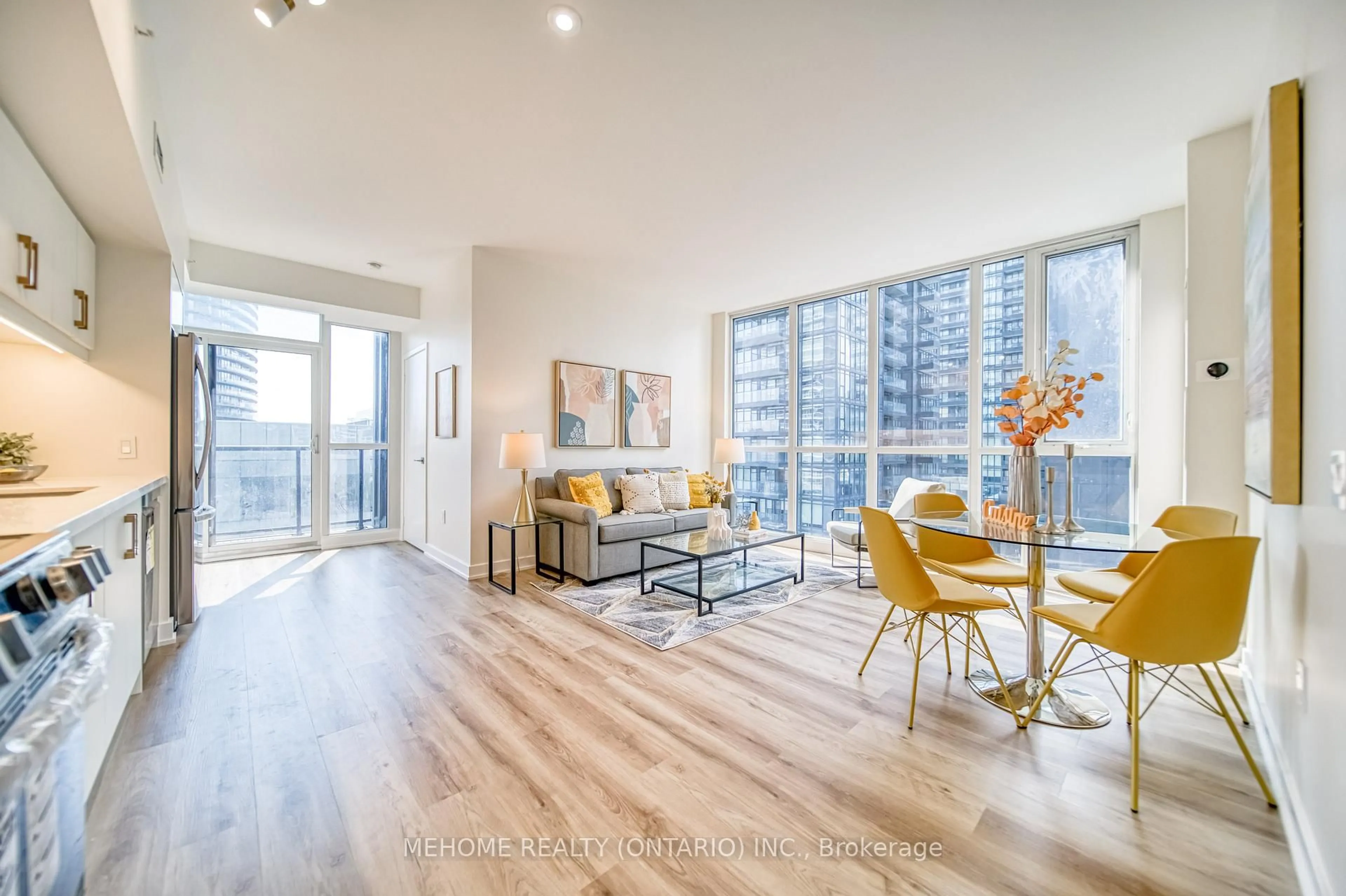 Living room with furniture, wood/laminate floor for 85 Queens Wharf Rd #706, Toronto Ontario M5V 0J9