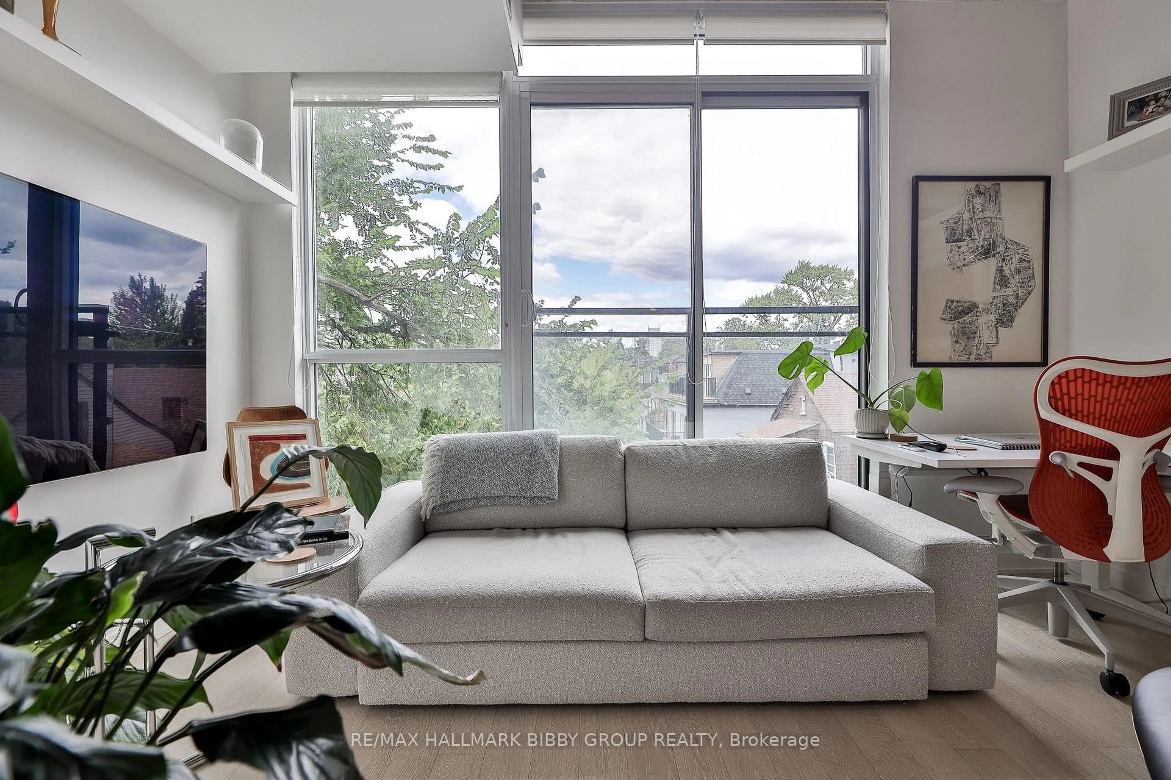 Living room with furniture, unknown for 130 Rusholme Rd #309, Toronto Ontario M6H 1A7
