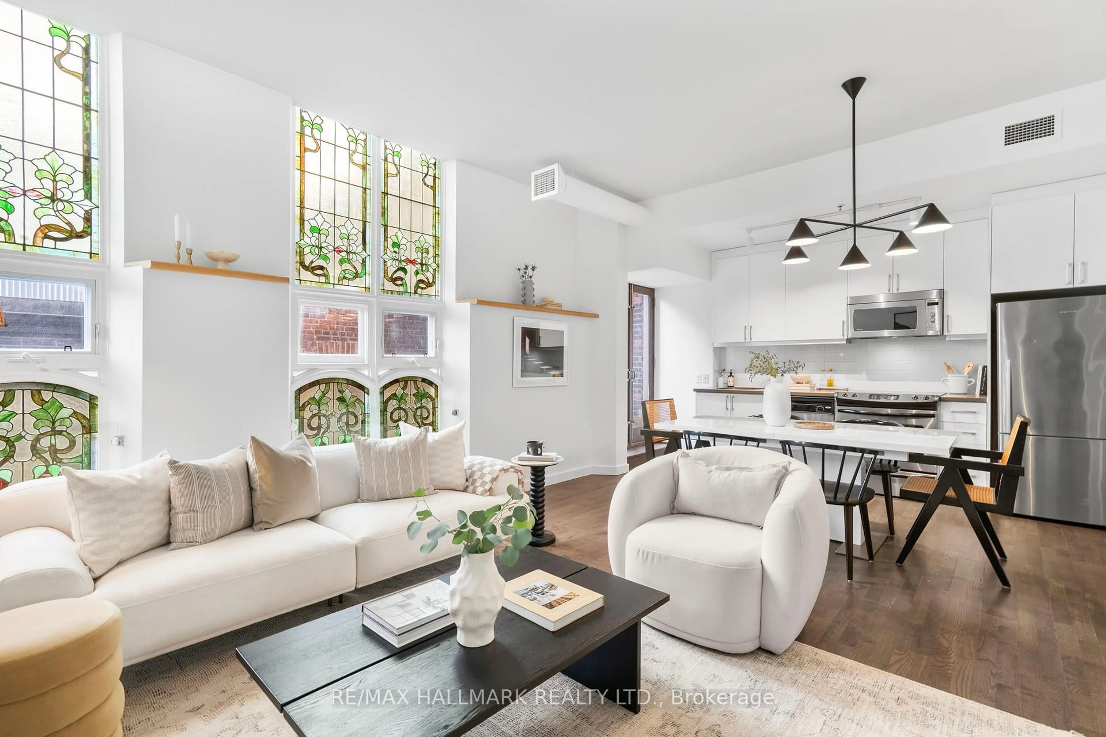Living room with furniture, unknown for 701 Dovercourt Rd #202, Toronto Ontario M6H 2W7