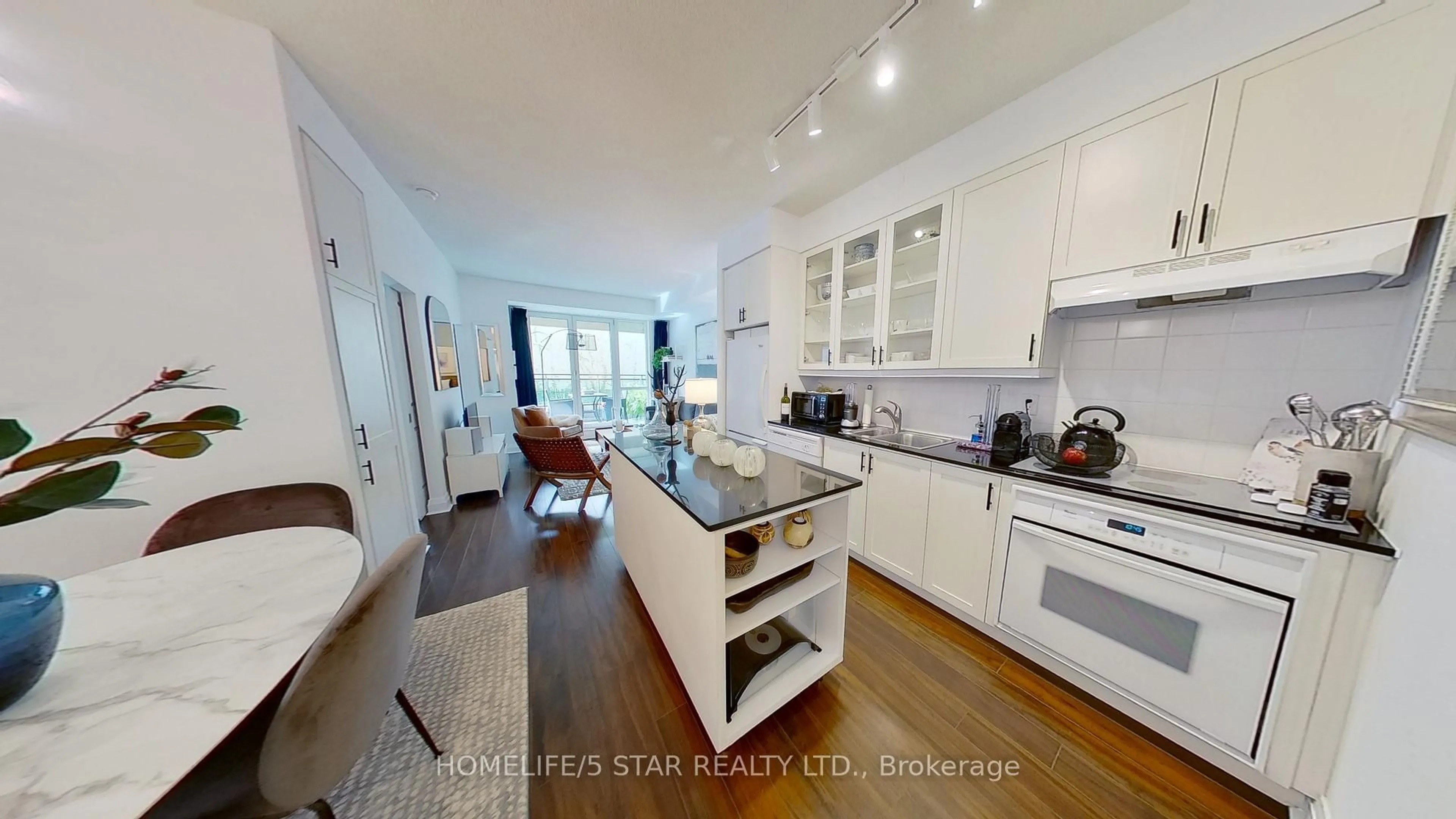 Open concept kitchen, wood/laminate floor for 25 SCRIVENER Sq #209, Toronto Ontario M4W 3Y6