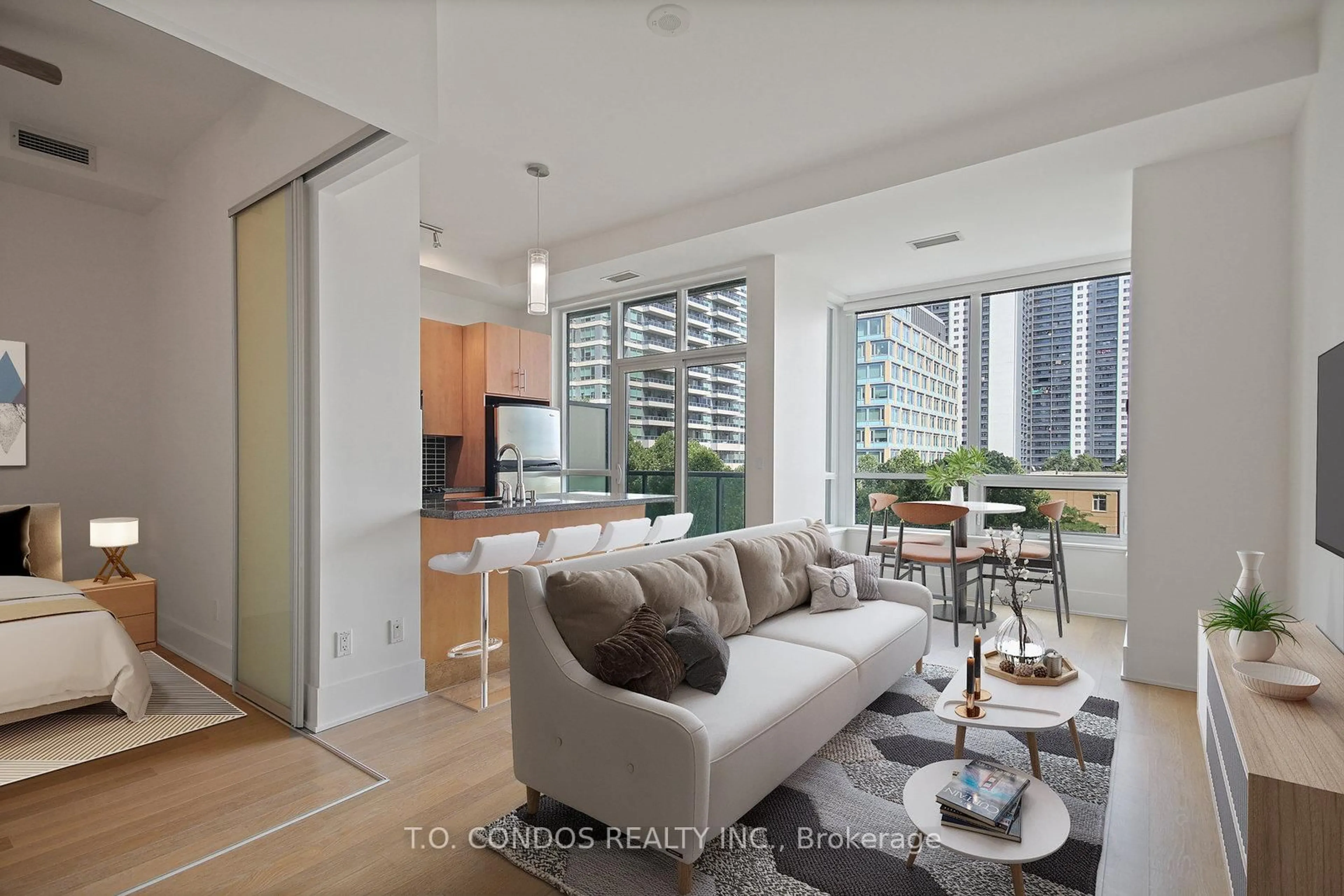 Living room with furniture, unknown for 120 Homewood Ave #523, Toronto Ontario M4Y 2J3