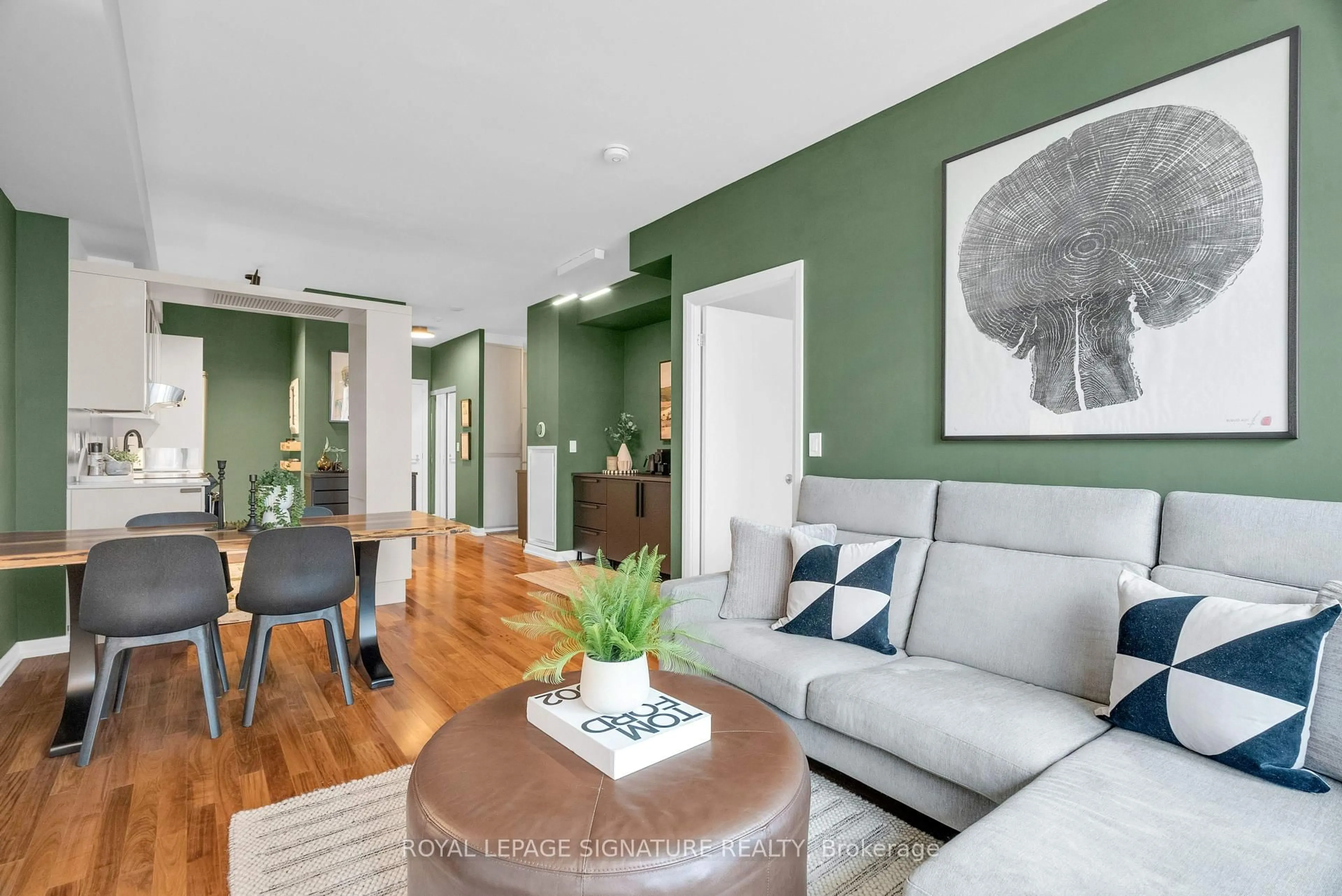 Living room with furniture, wood/laminate floor for 111 Elizabeth St #1208, Toronto Ontario M5G 1P7