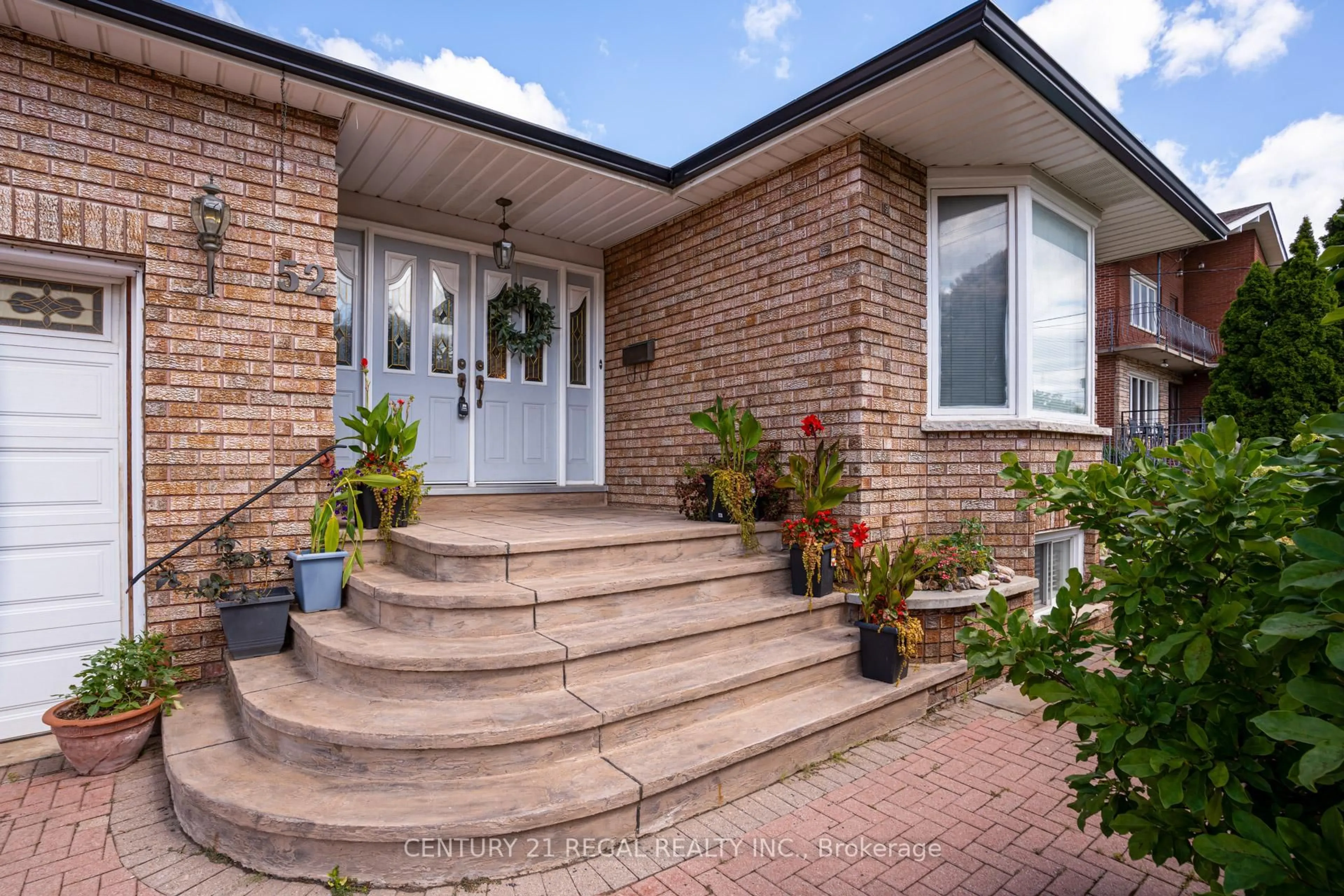 Home with brick exterior material, street for 52 Ranee Ave, Toronto Ontario M6A 1M9