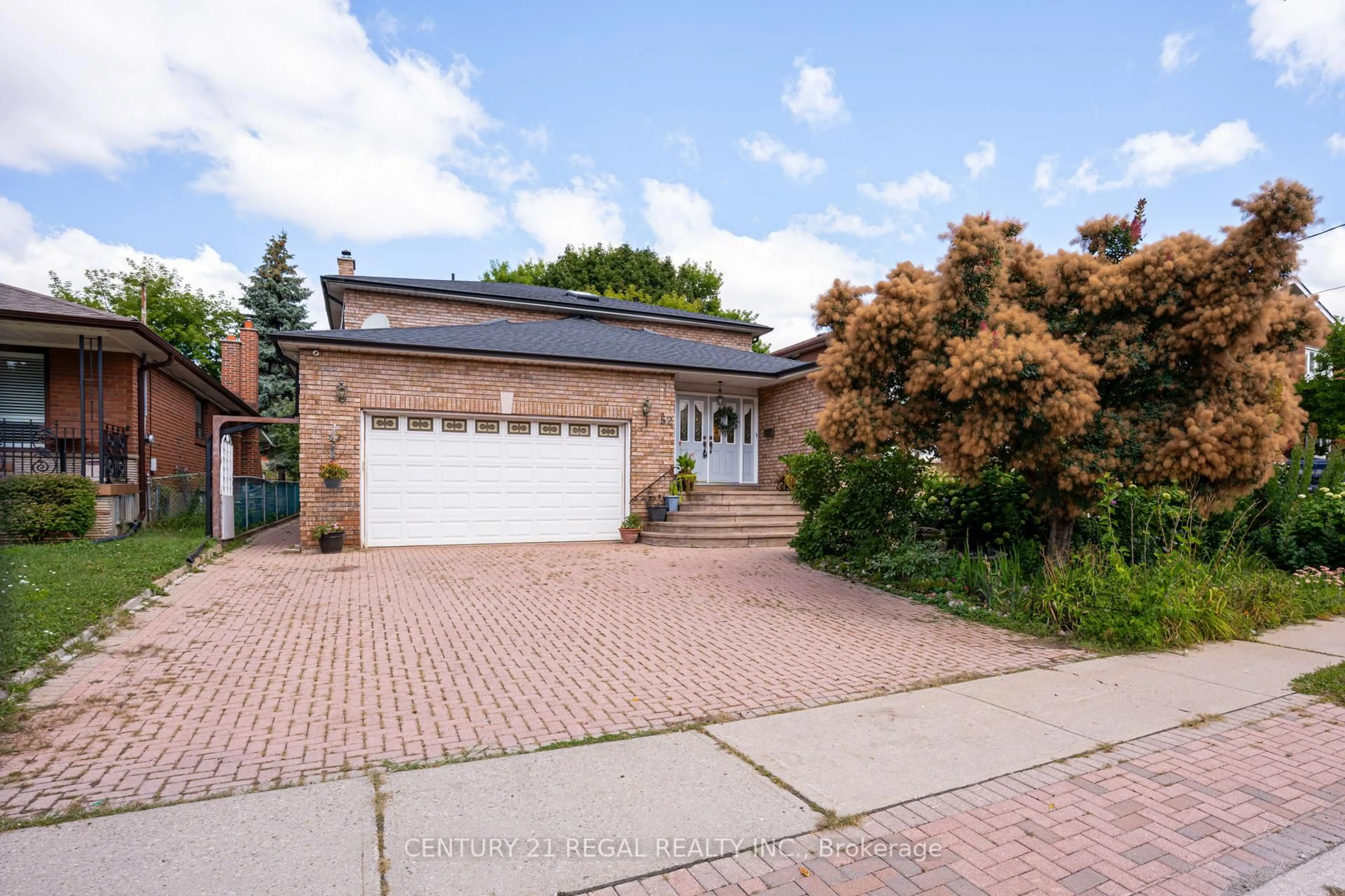 Home with brick exterior material, street for 52 Ranee Ave, Toronto Ontario M6A 1M9