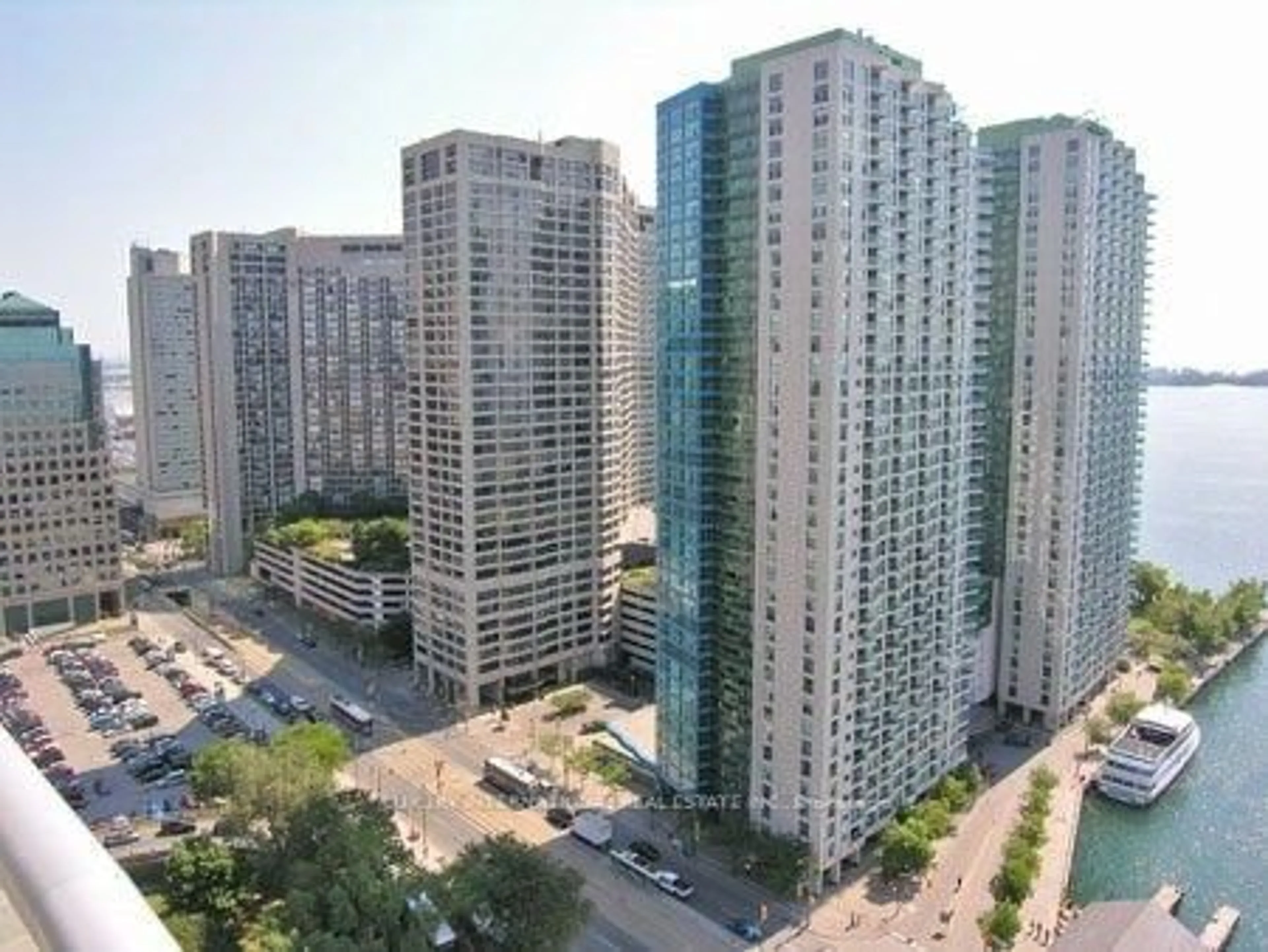 A pic from outside/outdoor area/front of a property/back of a property/a pic from drone, city buildings view from balcony for 77 Harbour Sq #3608, Toronto Ontario M5J 2S2