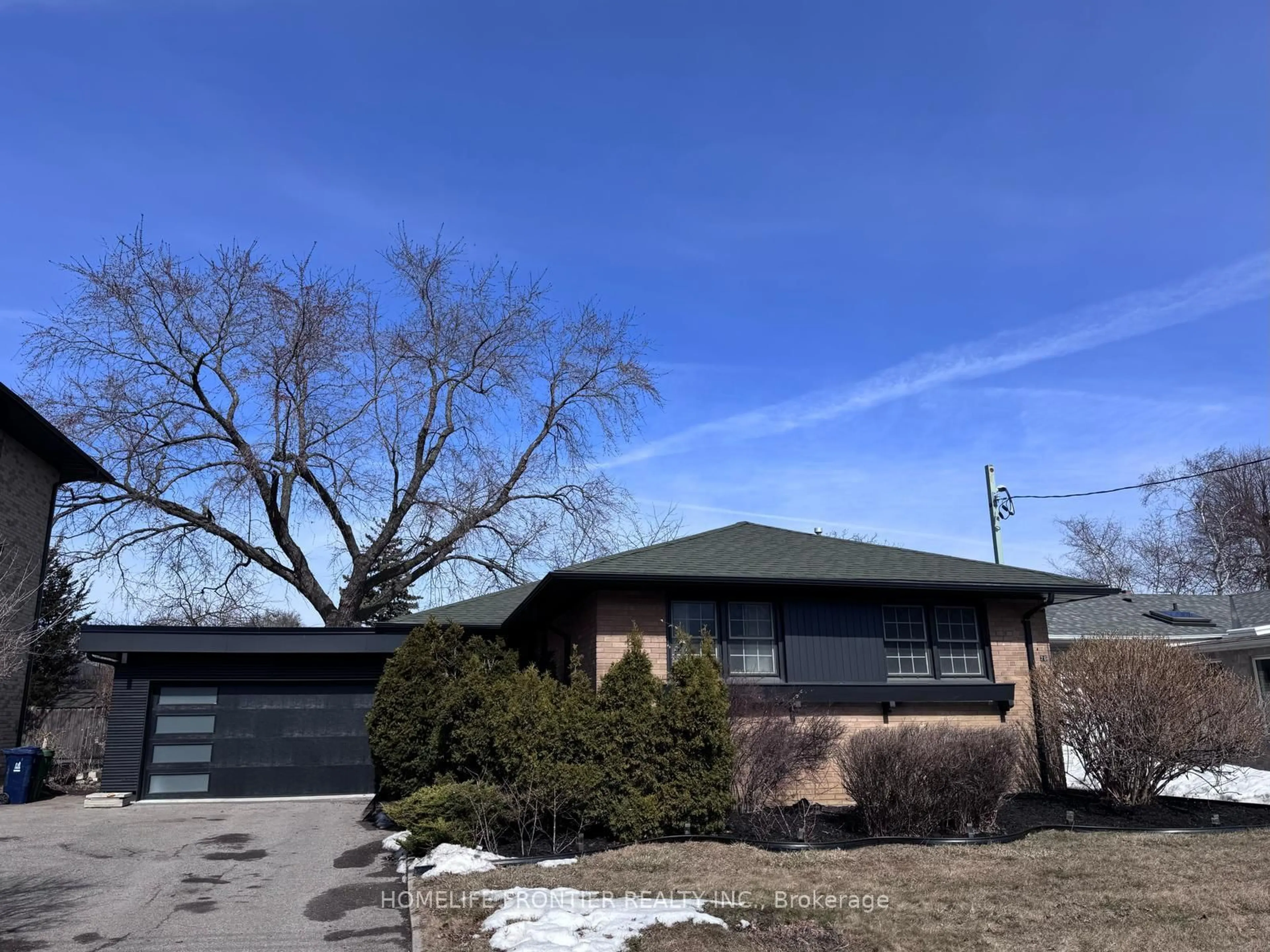 Home with brick exterior material, street for 26 Trophy Dr, Toronto Ontario M4A 1L8