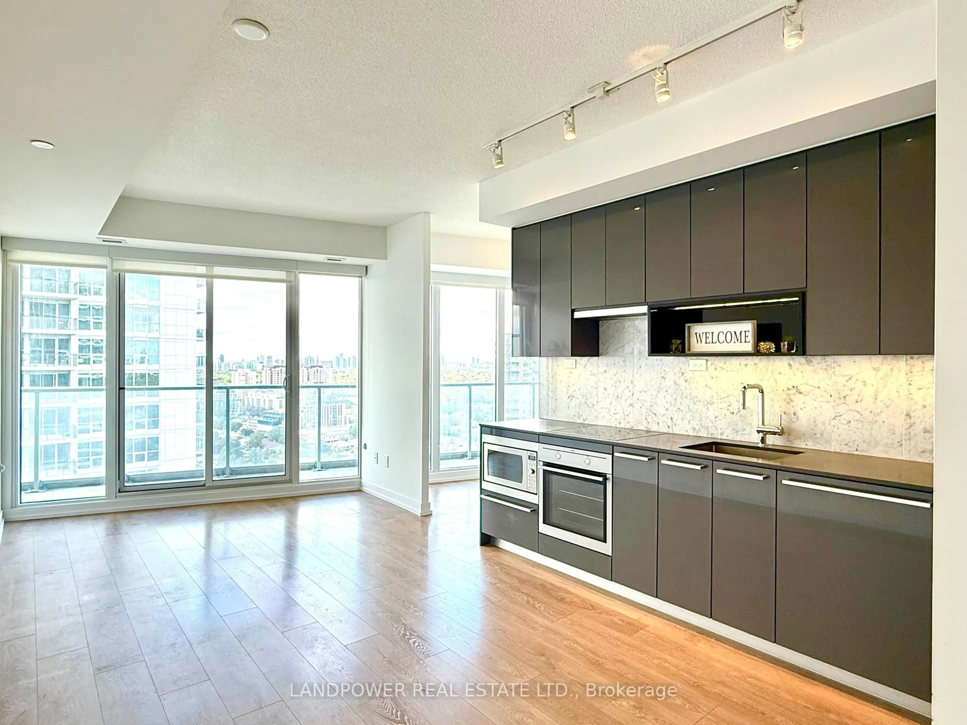 Open concept kitchen, wood/laminate floor for 115 McMahon Dr #3502, Toronto Ontario M2K 0E3
