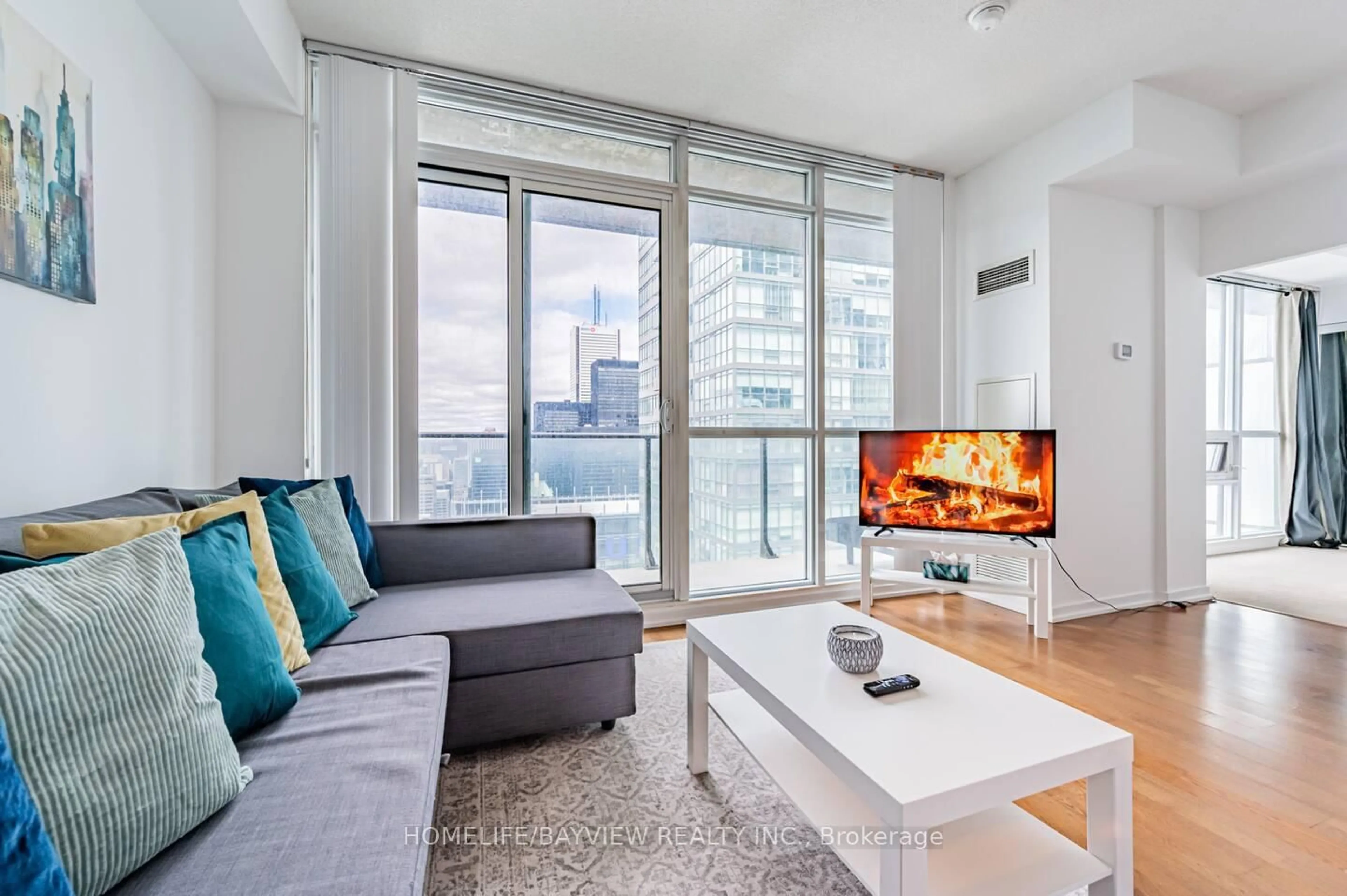 Living room with furniture, unknown for 55 bremner Blvd #4703, Toronto Ontario M5J 0A6