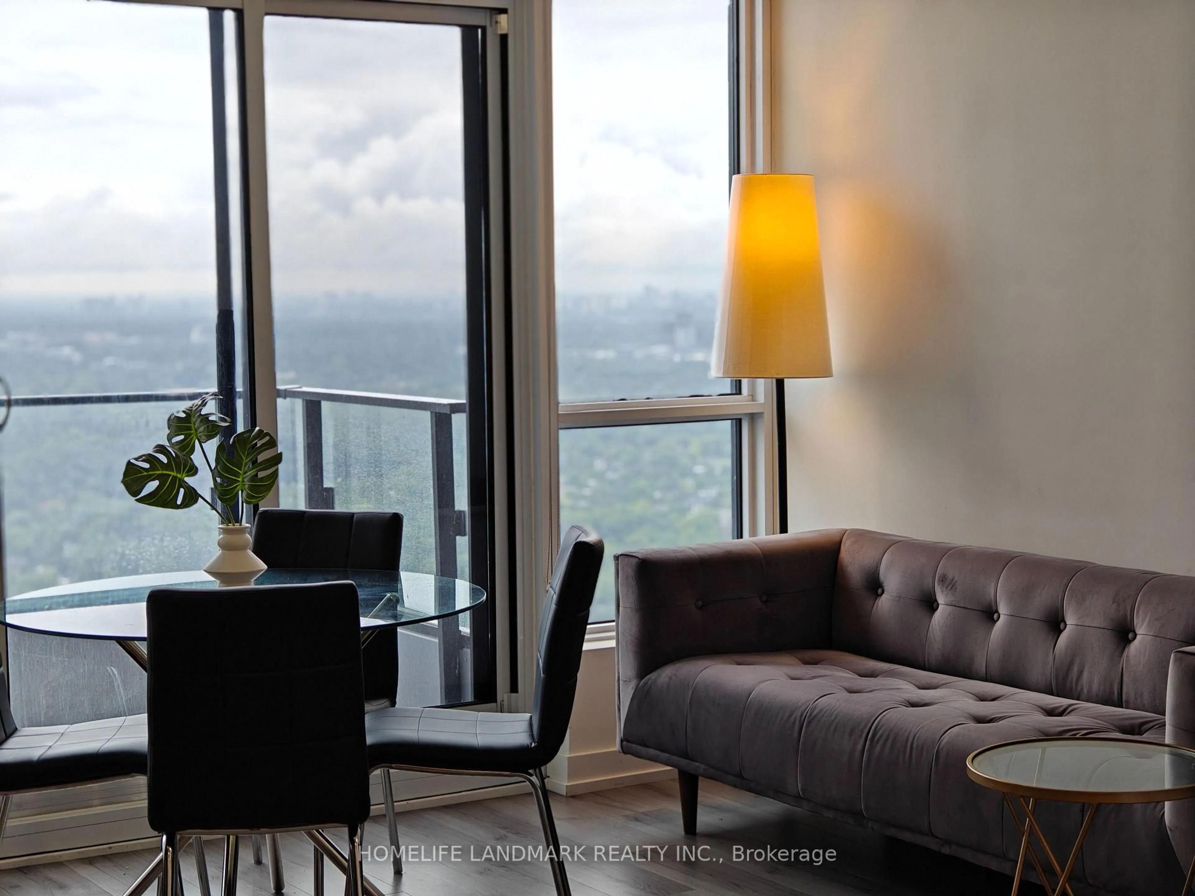 Living room with furniture, wood/laminate floor for 395 Bloor St #5405, Toronto Ontario M4W 1H7