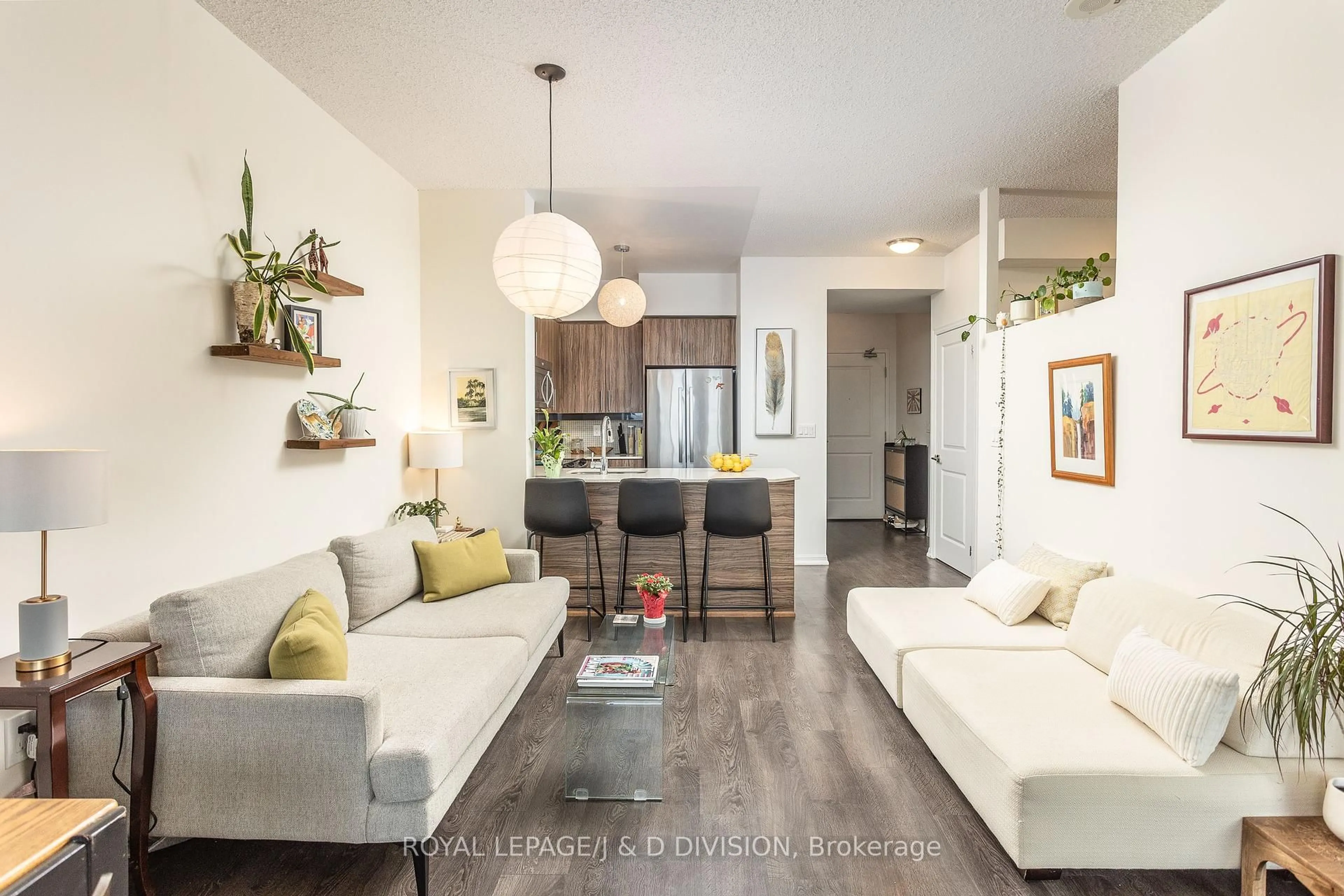 Living room with furniture, wood/laminate floor for 125 Western Battery Rd #2313, Toronto Ontario M6K 3S1
