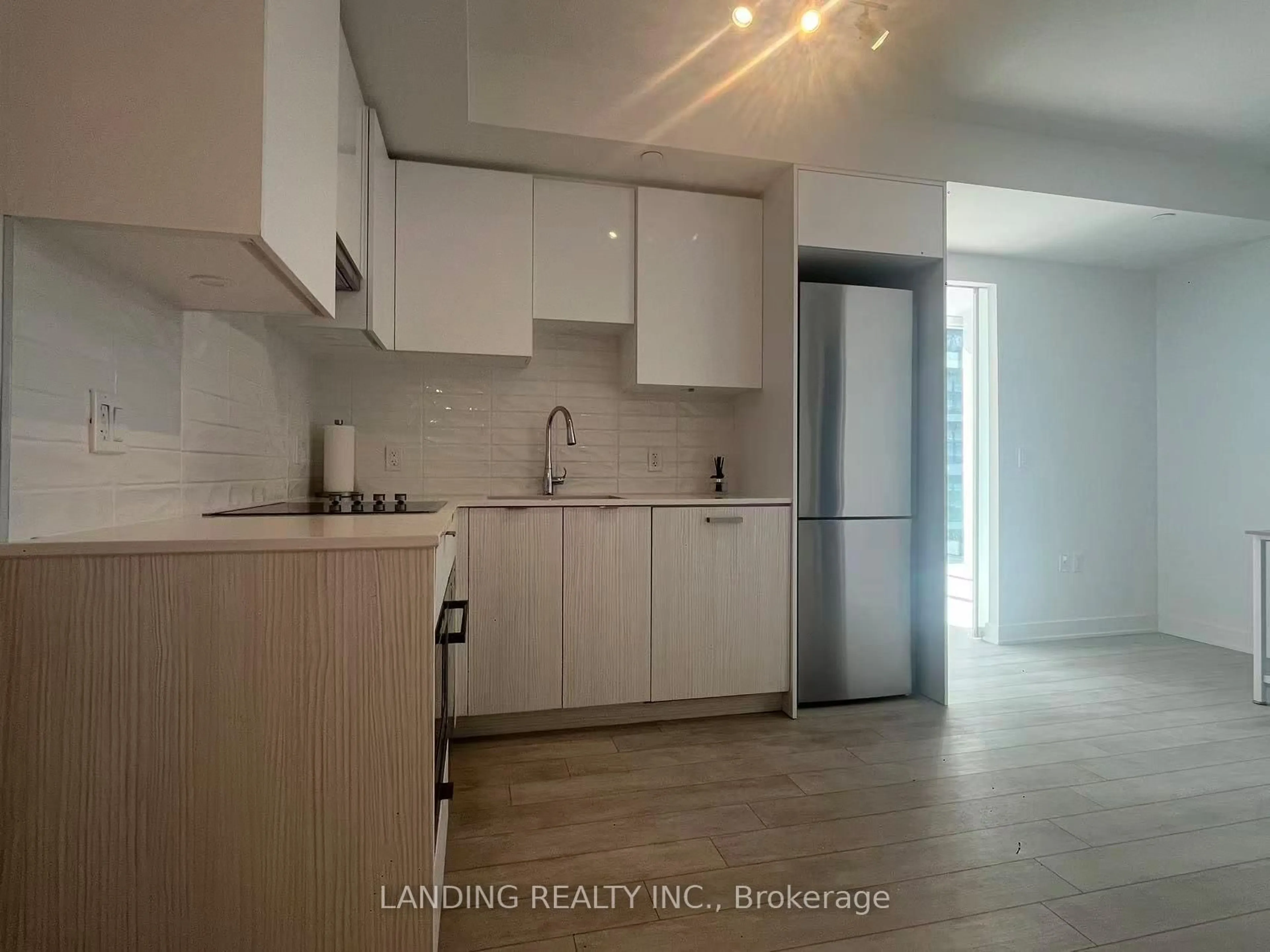 Kitchen with laundary machines, unknown for 195 Redpath Ave #2612, Toronto Ontario M4P 0E4
