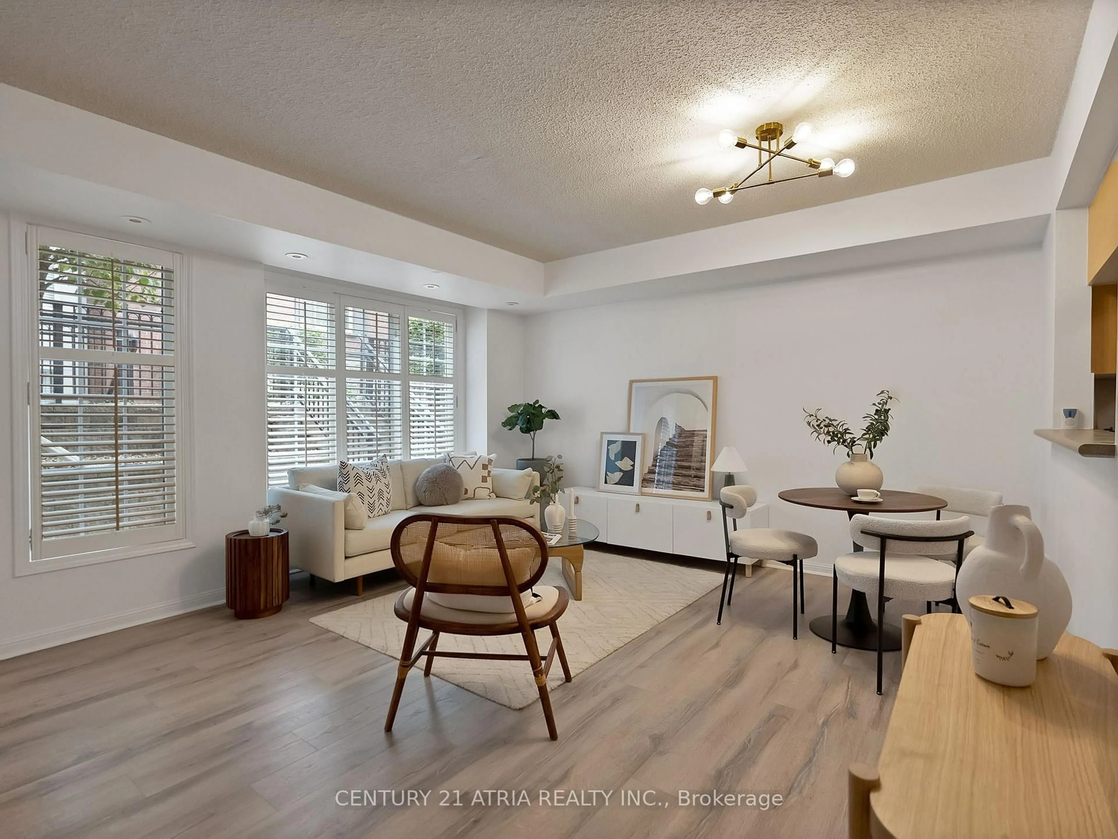 Living room with furniture, wood/laminate floor for 5 Everson Dr #1106, Toronto Ontario M2N 7C3