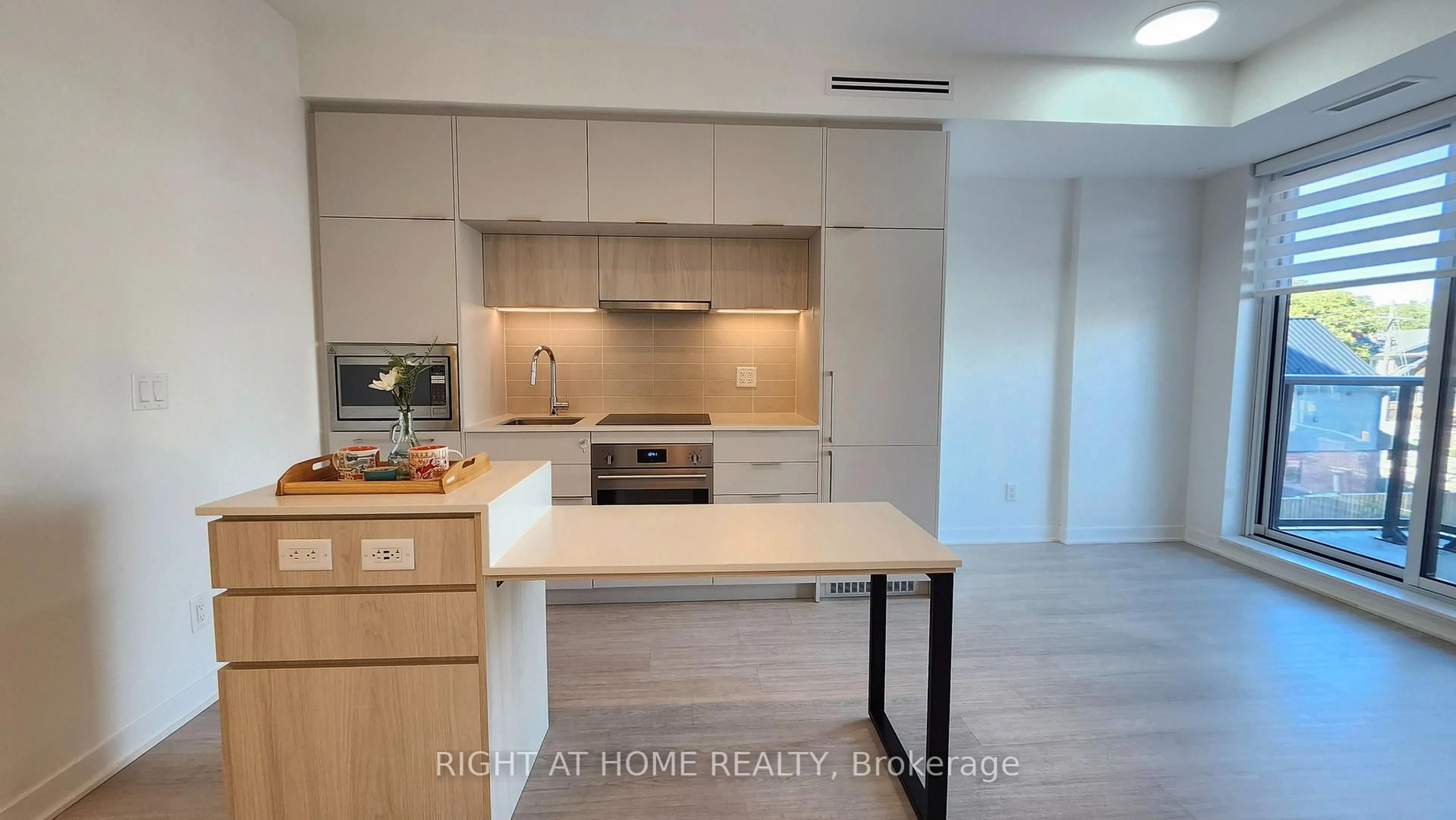 Open concept kitchen, unknown for 185 Alberta Ave #406, Toronto Ontario M6C 0A5