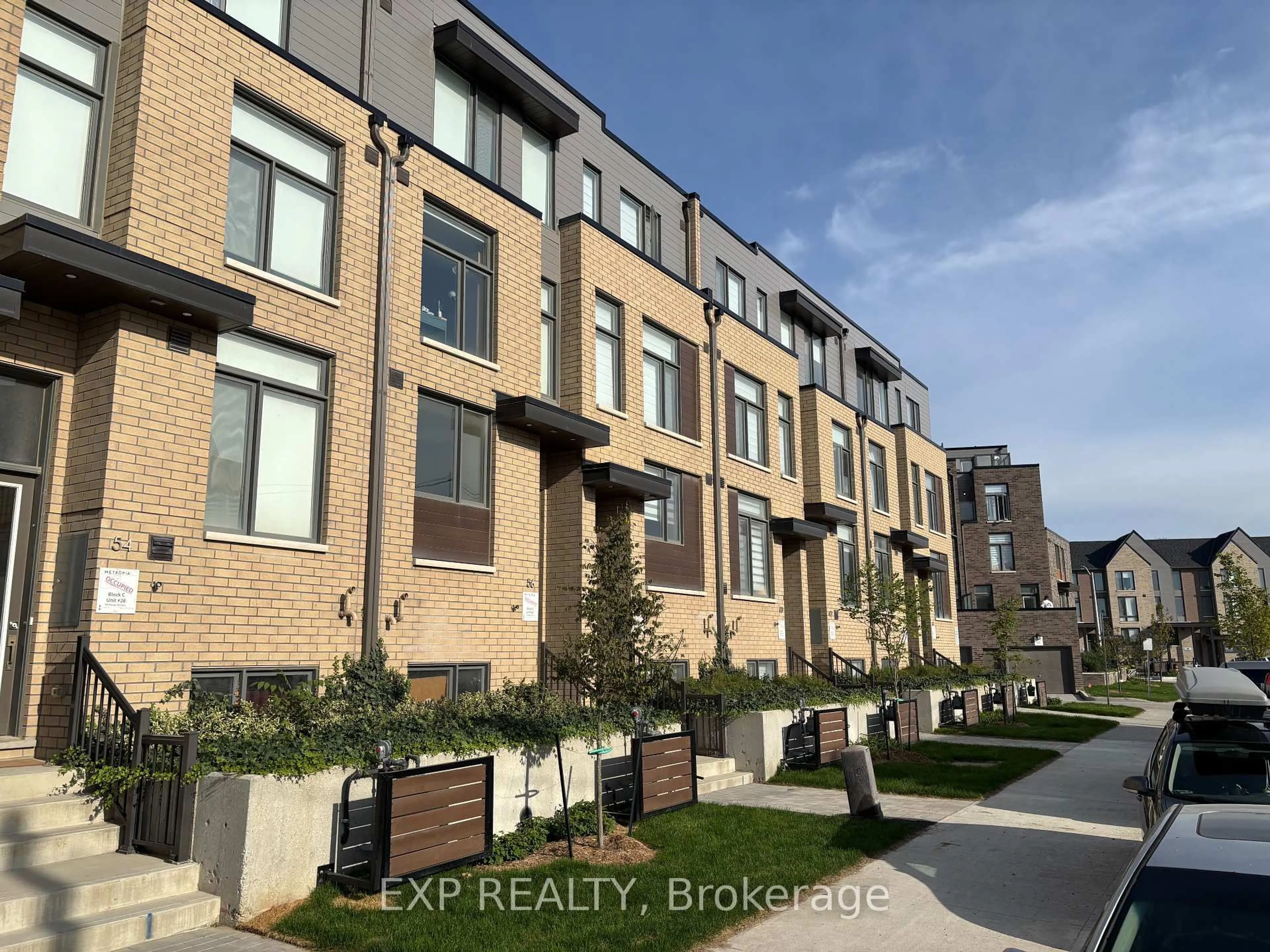 A pic from outside/outdoor area/front of a property/back of a property/a pic from drone, street for 58 Hooyo Terr, Toronto Ontario M6A 0G1