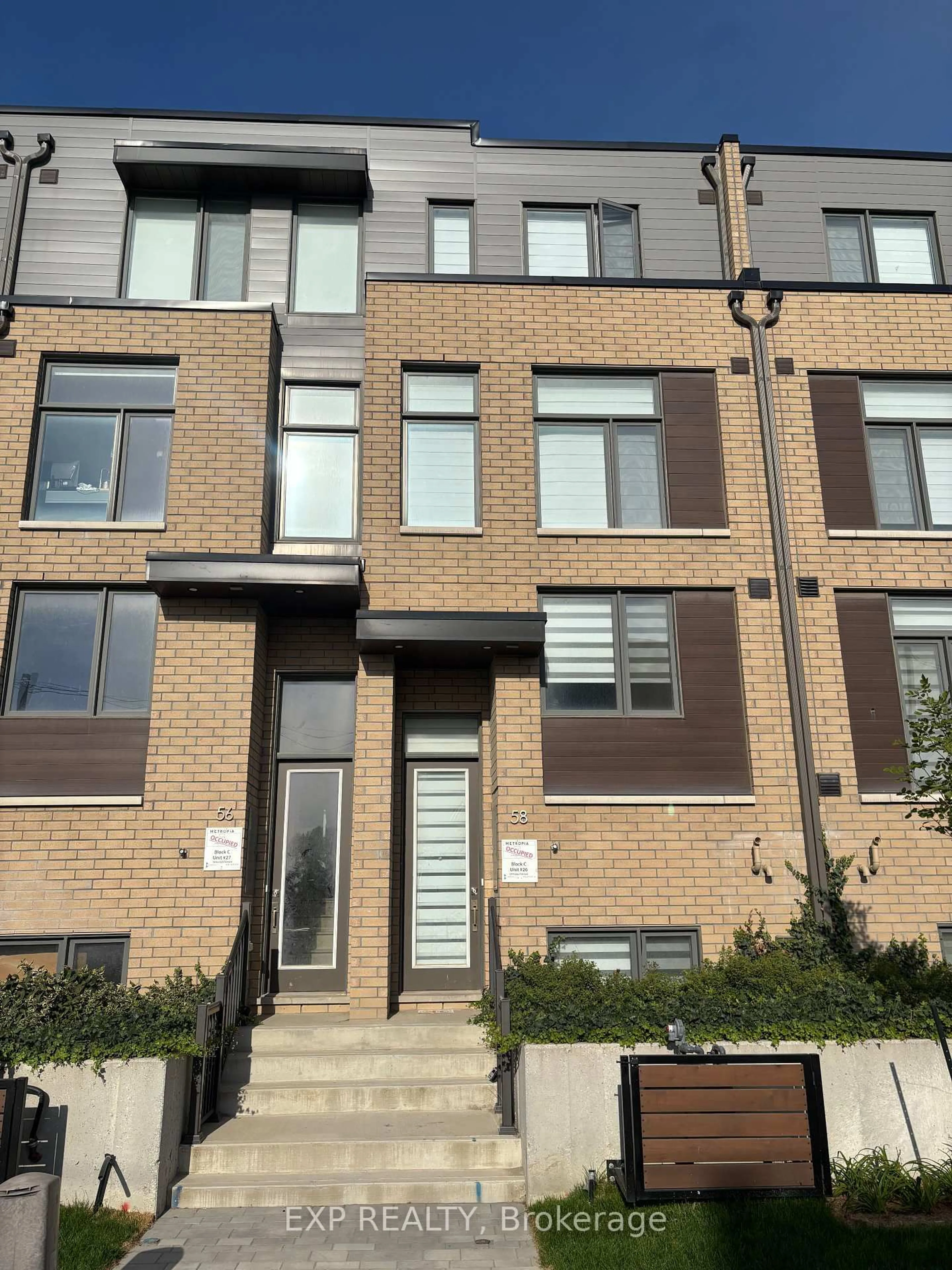 Home with brick exterior material, street for 58 Hooyo Terr, Toronto Ontario M6A 0G1