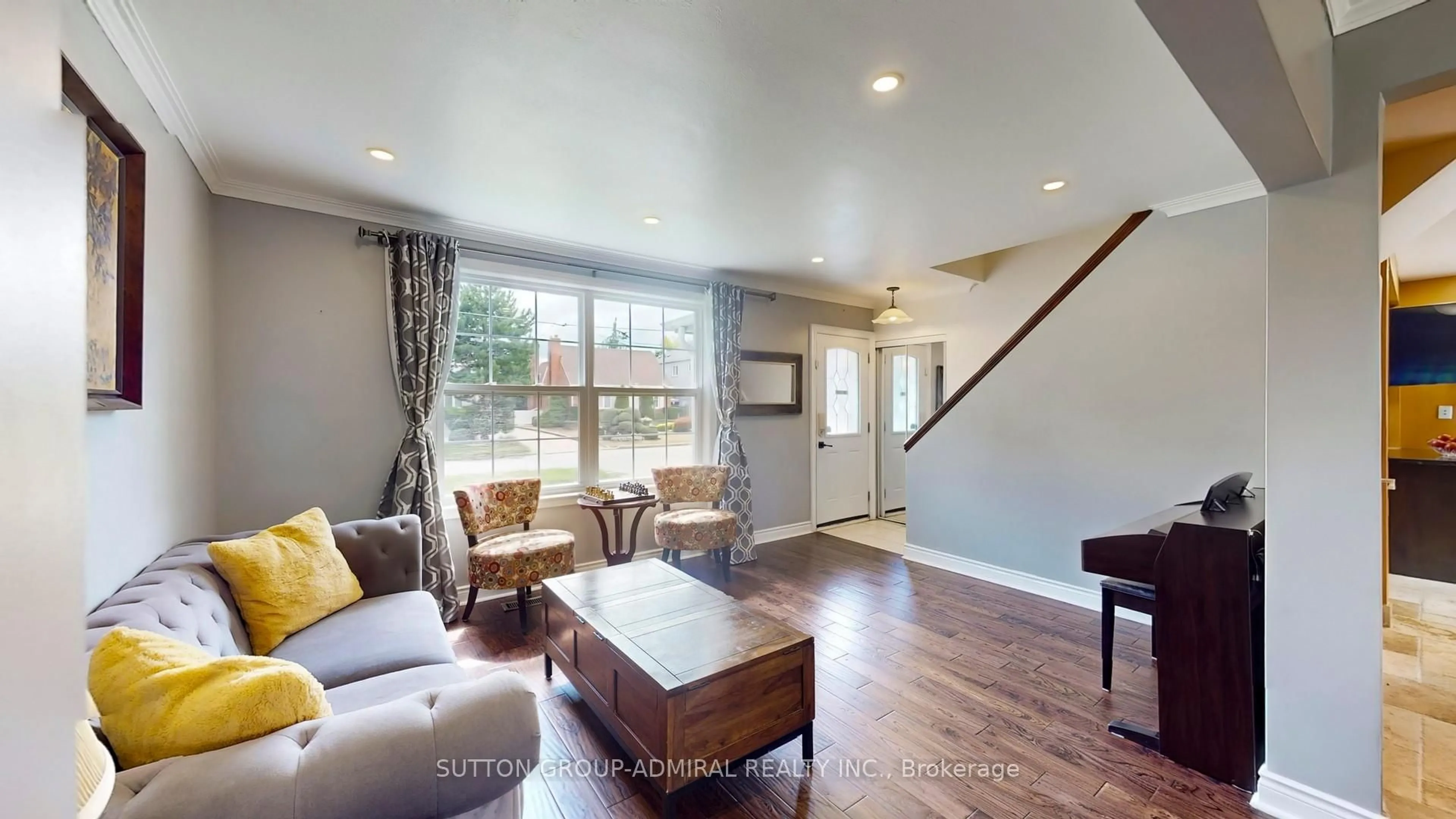 Living room with furniture, wood/laminate floor for 78 Goulding Ave, Toronto Ontario M2M 1L2