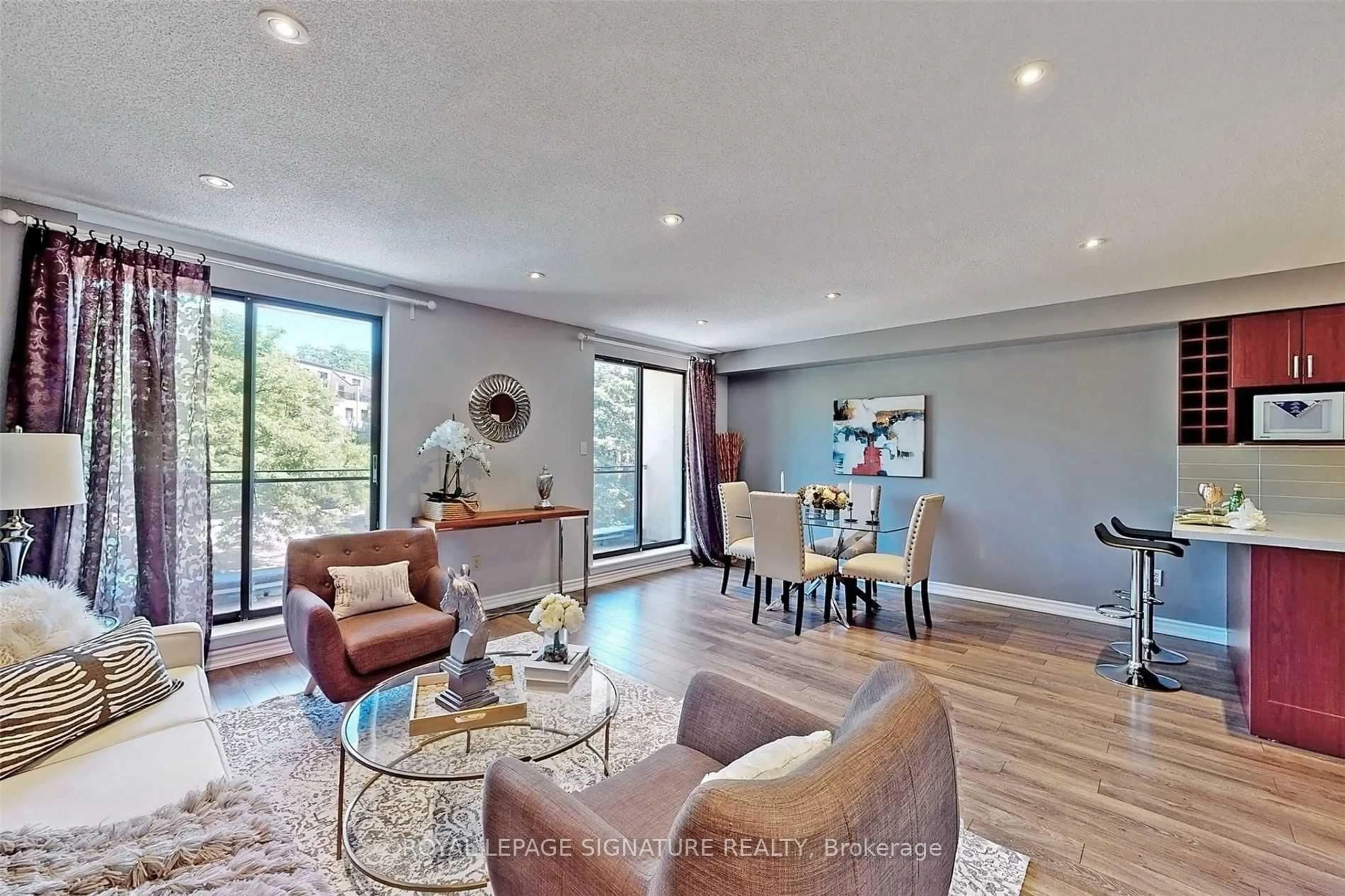 Living room with furniture, unknown for 20 Moonstone Bywy #190, Toronto Ontario M2H 3J4