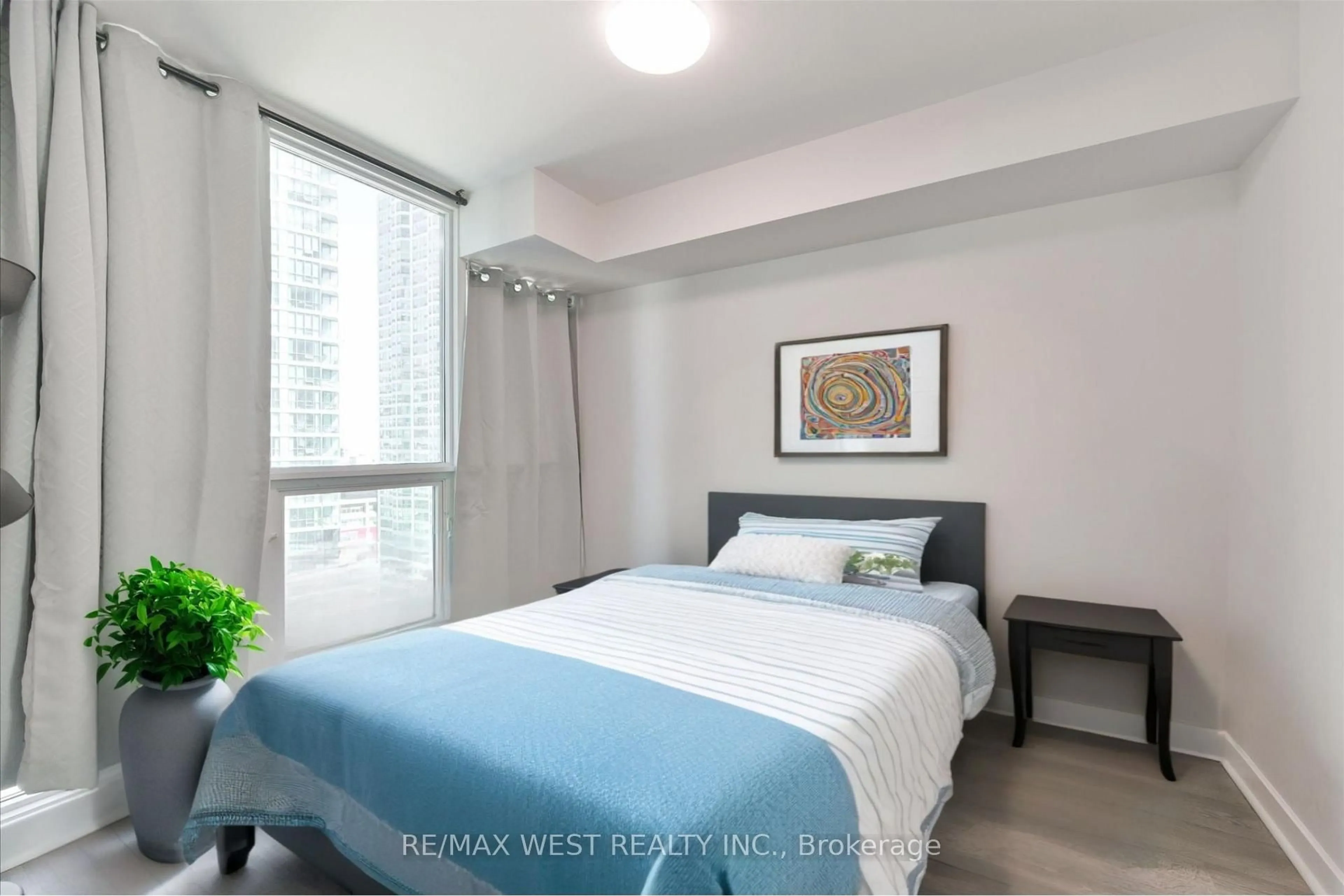 Bedroom with bed, unknown for 33 Bay St #1504, Toronto Ontario M5J 2Z3