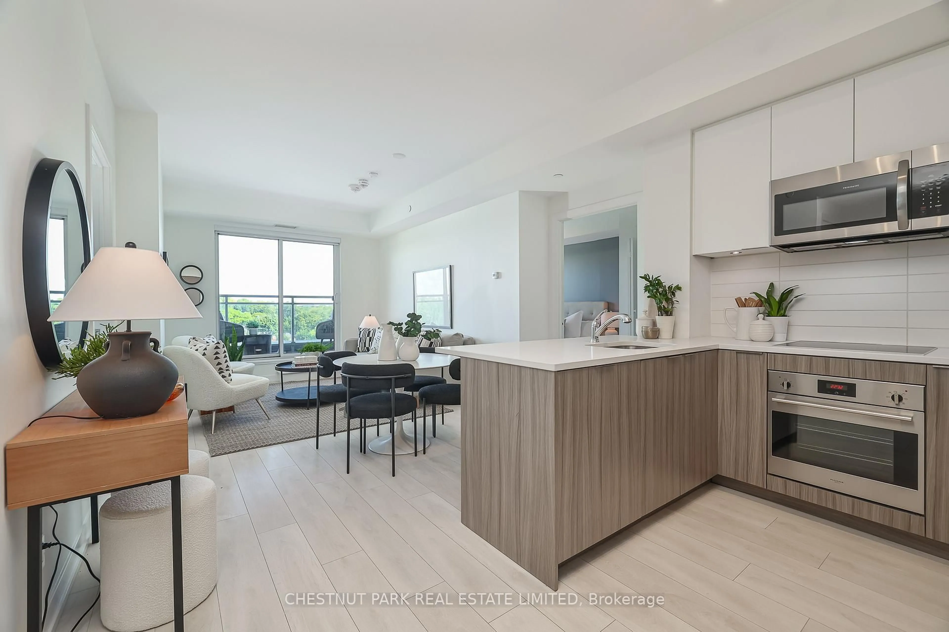 Open concept kitchen, unknown for 223 St Clair Ave #704, Toronto Ontario M4V 0A5