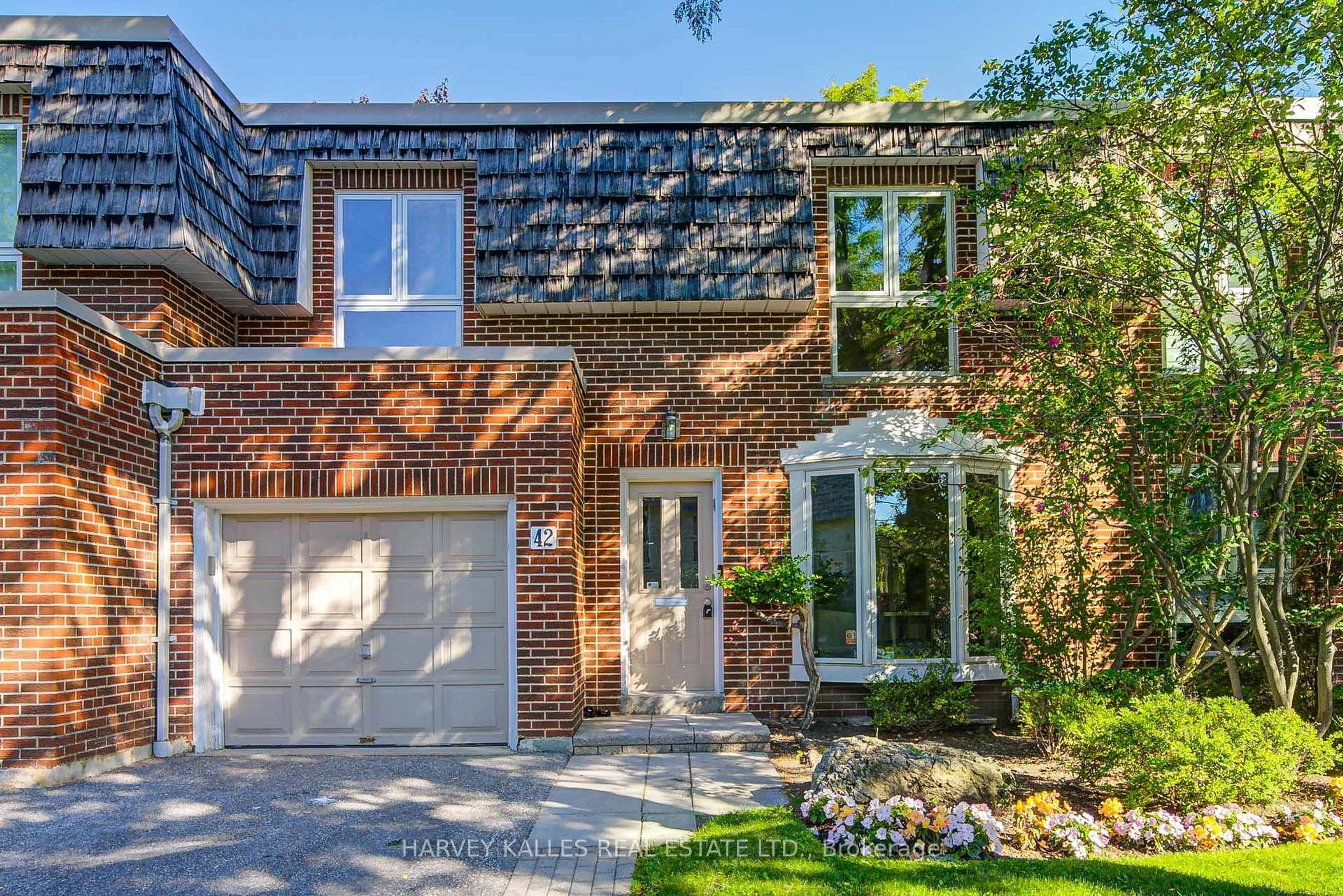 Home with brick exterior material, street for 42 Crimson Mill Way, Toronto Ontario M2L 1T6