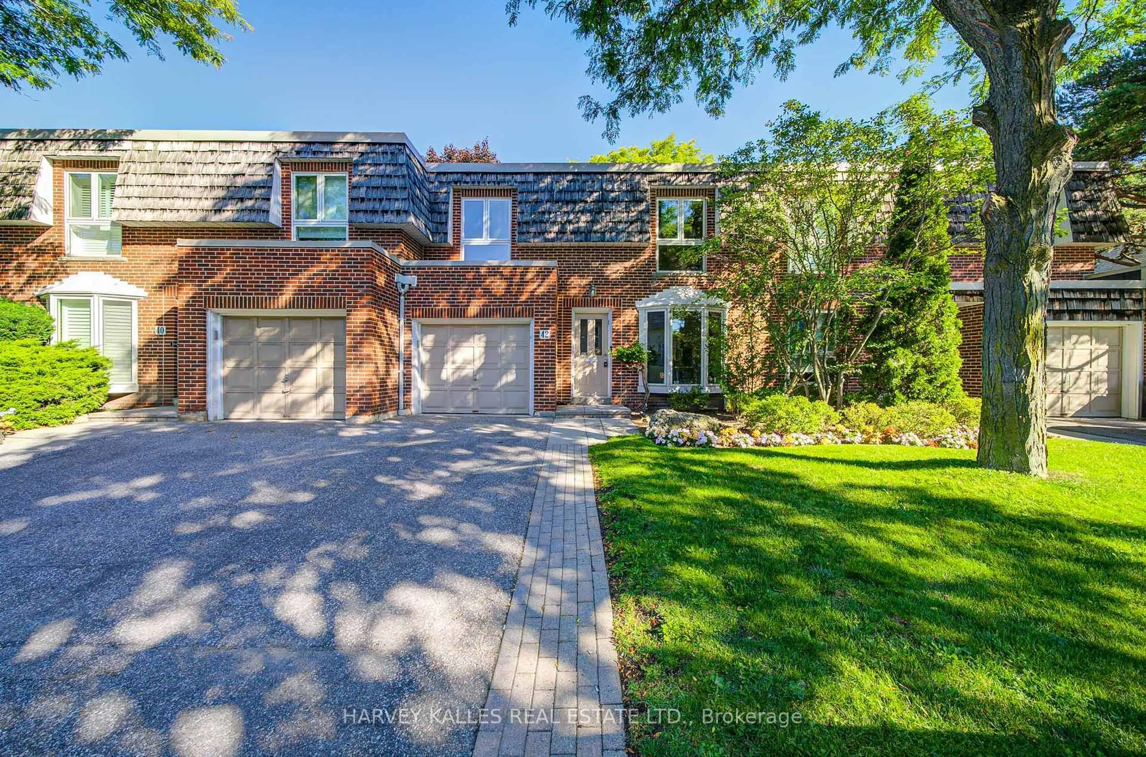 Home with brick exterior material, street for 42 Crimson Mill Way, Toronto Ontario M2L 1T6